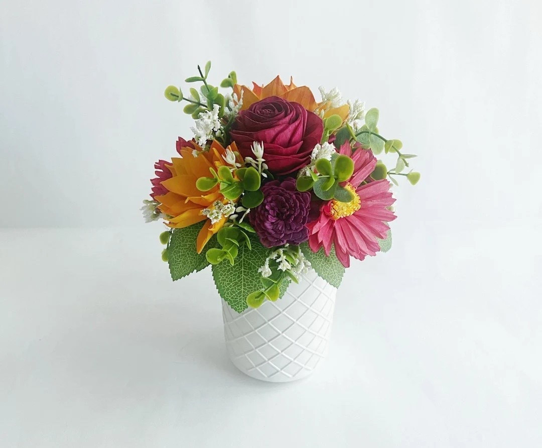 A forever-fresh floral moment 🌸 This vibrant sola wood flower arrangement brings all the beauty of real blooms without the worry of wilting. Handcrafted from soft, custom-painted wood flowers and lush faux greenery, it’s perfectly styled in a white vase for easy gifting or effortless home décor. An eco-friendly choice that makes a thoughtful gift for birthdays, anniversaries, graduations, or simply brightening someone’s day.
#LTKHome #ForeverFlowers #SolaWoodFlowers #EtsyDecor #GiftIdeas #EcoFriendlyDecor #FloralArrangement #HomeStyling

#LTKHome #LTKSeasonal #LTKFindsUnder50