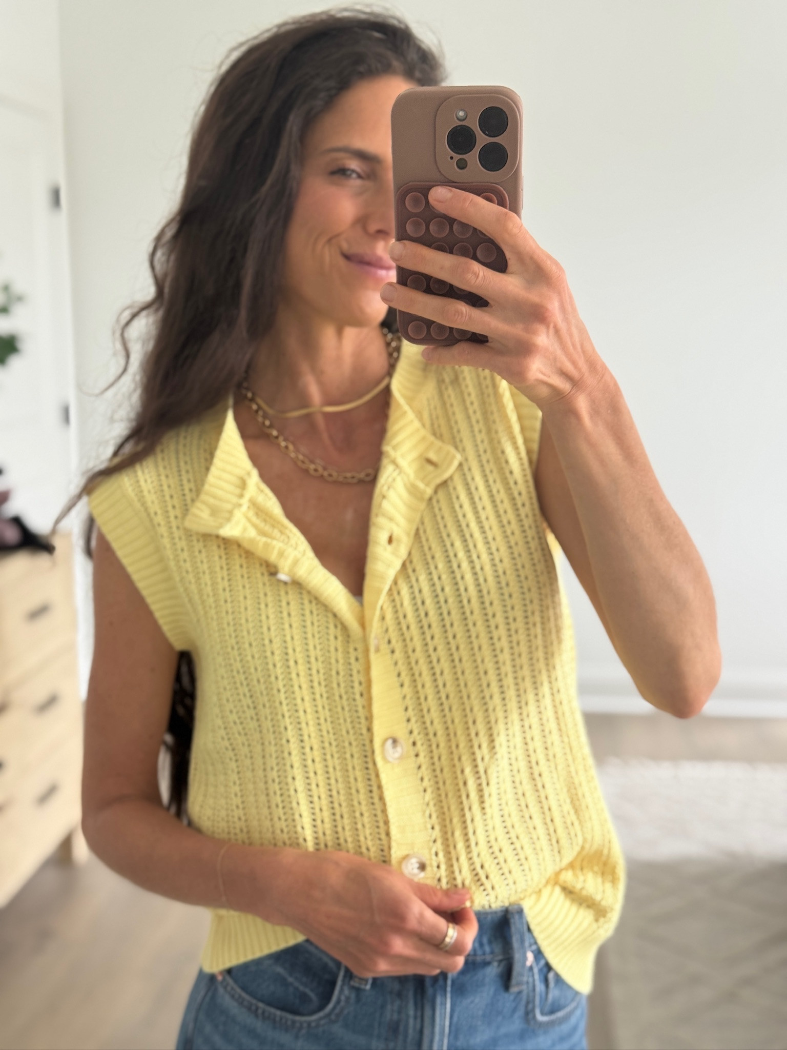 Bright spring outfit idea with a yellow knit tank, relaxed denim, and woven flats. Simple everyday style linked in LTK.

#LTKSeasonal #LTKmomlife #LTKootd