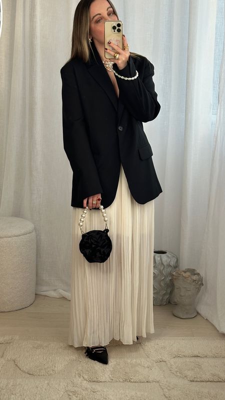 This skirt moves so beautifully, it’ll be a great wedding guest outfit spring staple 🤍 Pleated skirt | Maxi skirt | brunch outfits | Oversized blazer | Romantic | Cream skirt | Pearl bag | rose aesthetic | going out outfit 

#LTKSeasonal #LTKworkwear #LTKparties