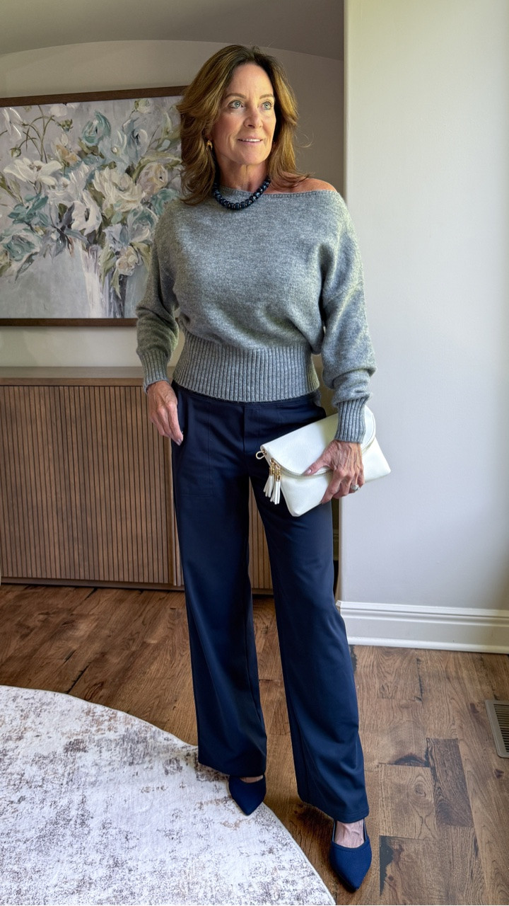 Wondering what to wear with navy pants this fall?

Pair them with a soft gray sweater for an easy, sophisticated color combination. The matching navy shoes create one long line, while the white clutch keeps the darker palette feeling fresh.

#navypantsoutfit #falloutfits #styleover50