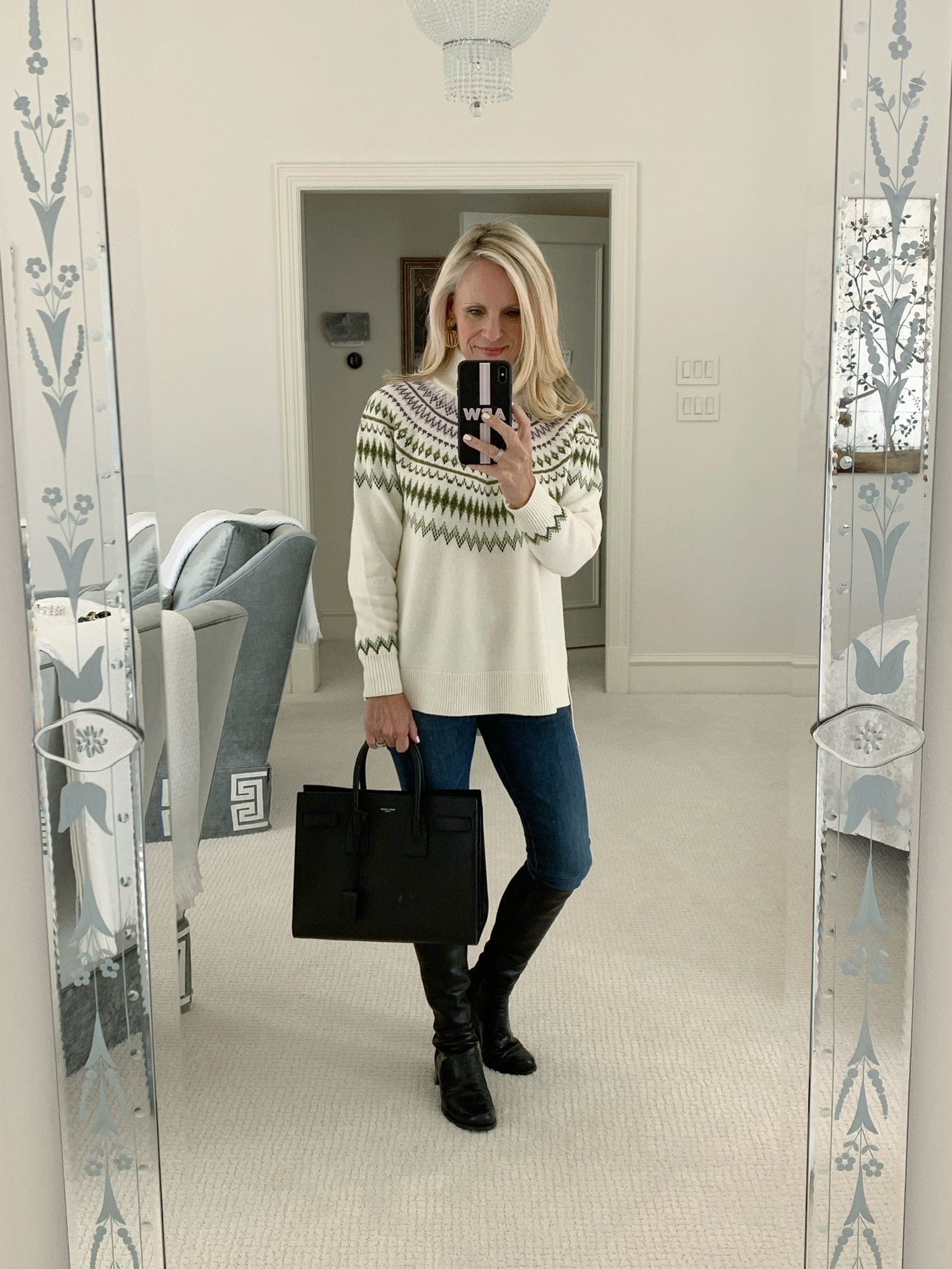 Similar patterned sweater, tall black boots, skinny jeans and a great black bag. 

#LTKstyletip #LTKHoliday #LTKSeasonal