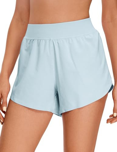 CRZ YOGA Mid Waisted Dolphin Athletic Shorts for Women Lightweight High Split Gym Workout Shorts with Liner Quick Dry Blue Linen X-Large | Amazon (US)