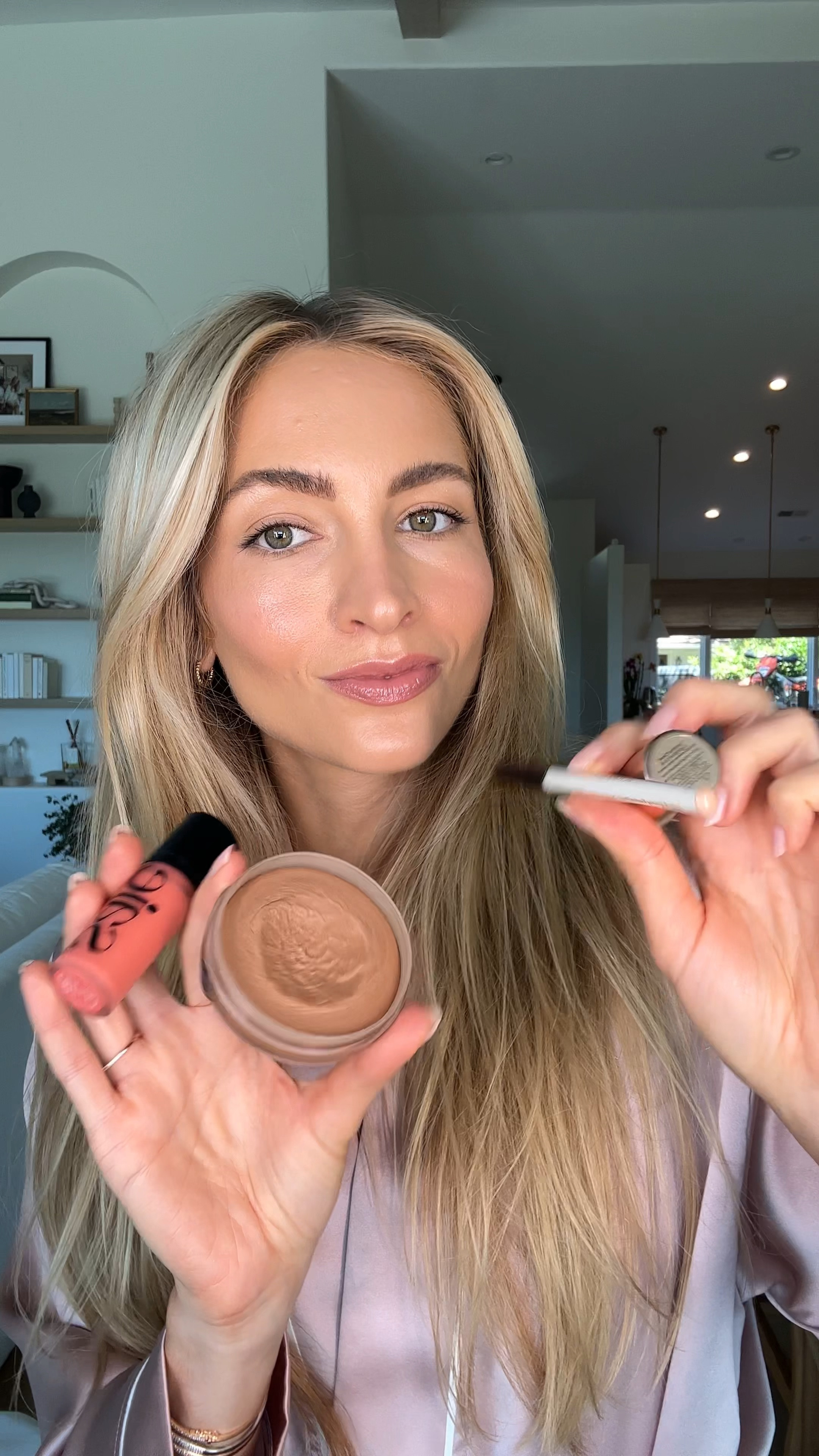 My “BRIGHT & AWAKE” summer makeup look - everything I’ve been using lately to take tired pale skin and make it bronzey and dewy!! I’m going for that 8 hours of good sleep look 😅

Products used here:

Victoria Beckham Beauty brightening eye pencil - this makes such a huge difference!! I like my lower waterline every single day with this 

Saie bronzer in medium - foolproof and easy to apply 

Saie blush in Poppy - love this shade (a tiny bit goes a long way - highly recommend applying to the back of your hand and dabbing with a brush to get the hang of the amount needed

It Cosmetics double ended brush - I use this for all my cream bronzers! (Also great for foundation/concealer, really anything)

YSE Beauty highlight - linked a similar option from MILK!

Rose Inc Brow Gel in clear - staple and I really think it’s helped my brows stay full too

(*** I also linked the mascara and brow pencil I used with this look even though I didn’t film it for the video)



#LTKFind #LTKunder100 #LTKbeauty