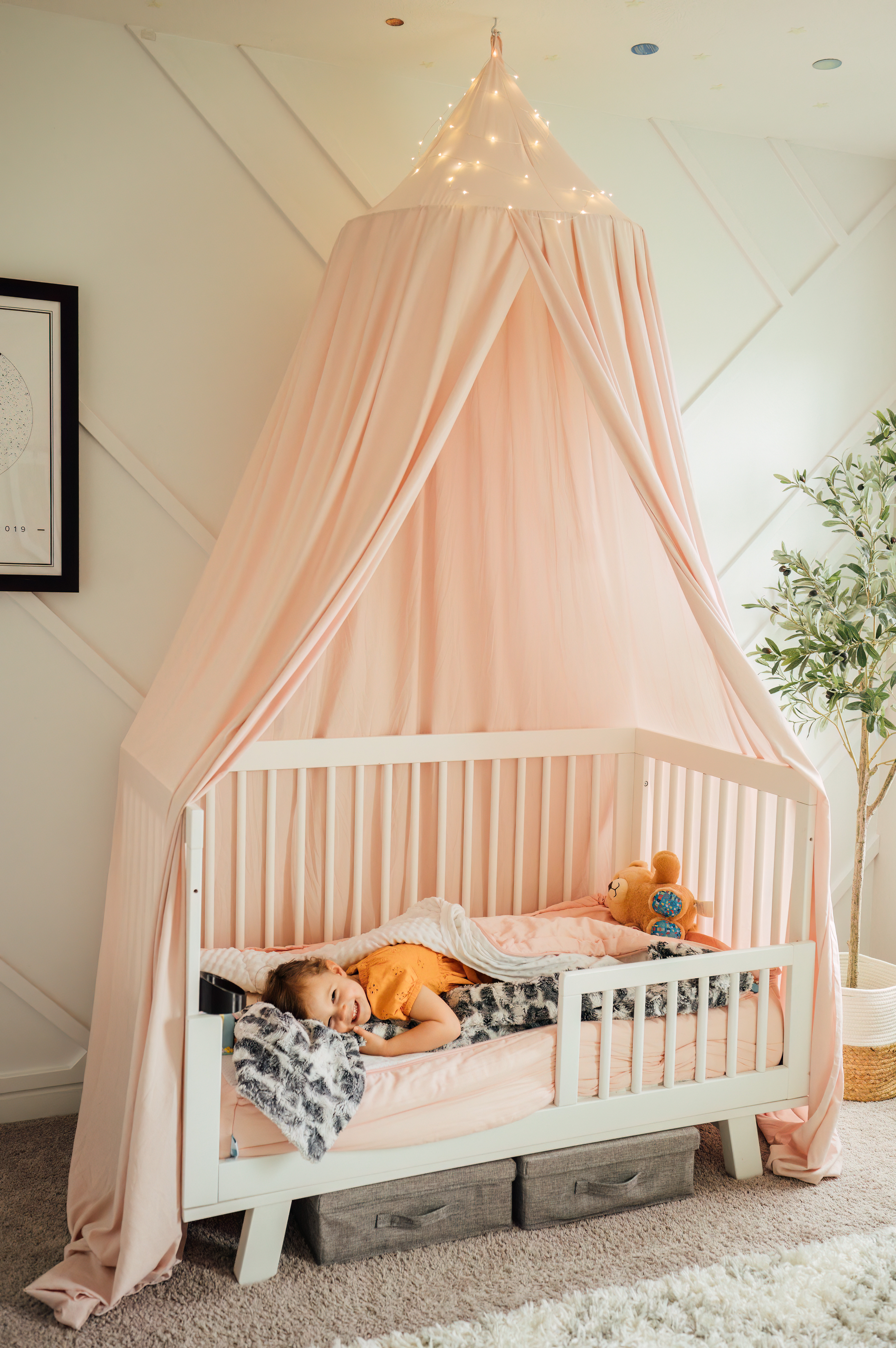 This cozy little setup has become one of my favorite corners in the house.

We transitioned Nova to this toddler bed and added a canopy with some twinkle lights to make it feel extra special. It’s soft, sweet, and gives her a little sense of magic at bedtime.

toddler bed setup, canopy bed for kids, cozy girl bedroom, toddler room decor, calming bedtime space, kids room ideas, neutral nursery transition, toddler room inspo, bedtime favorites for toddlers

#LTKHome #LTKKids #LTKBaby