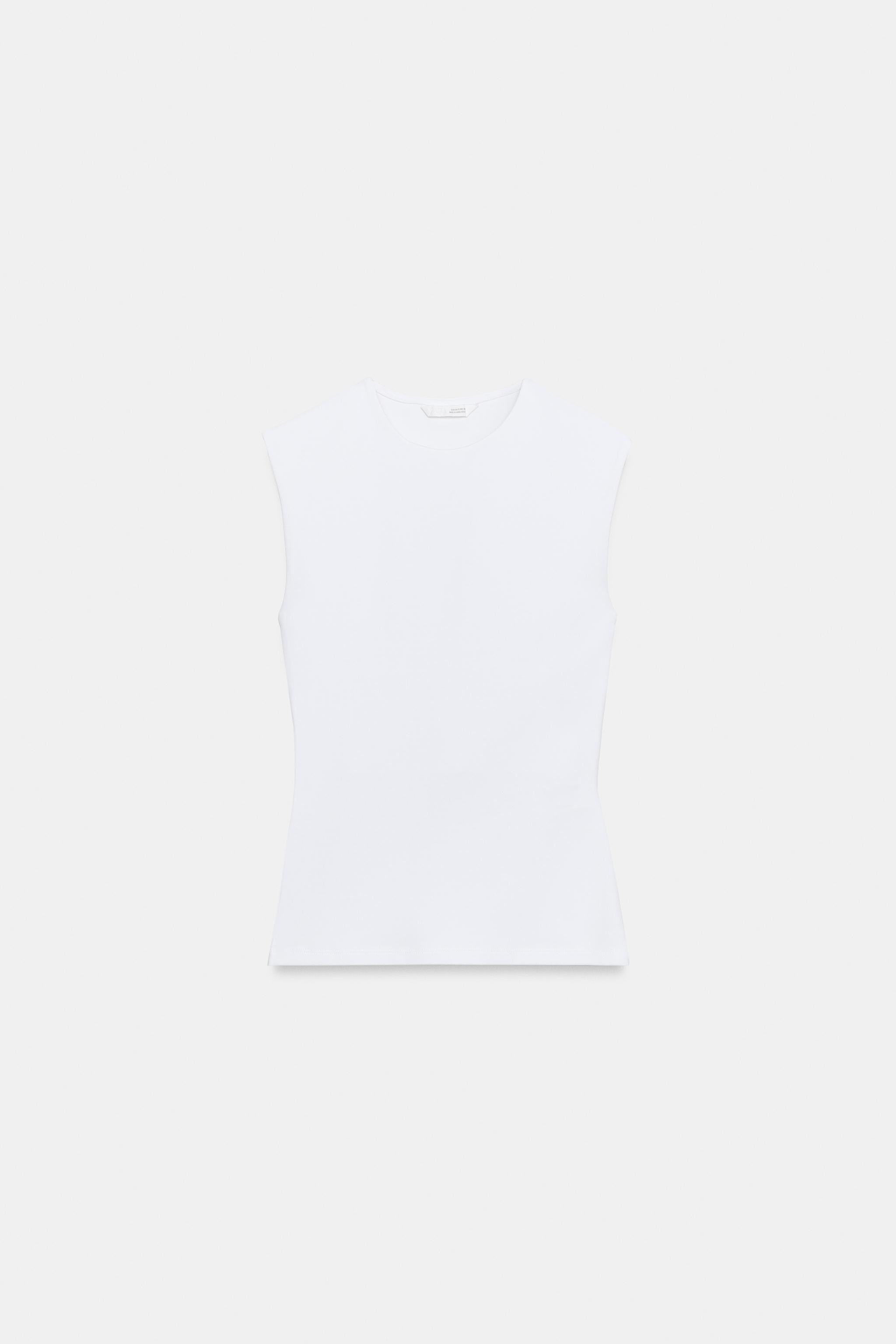 SLIM FIT - ROUND NECK - REGULAR LENGTH - SLEEVELESSTank top made from a cotton blend yarn. Round ... | Zara US