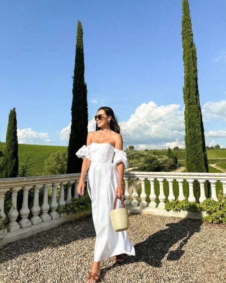 Kat Jamieson wears a white dress in Tuscany. 

#LTKtravel #LTKSeasonal #LTKitbag