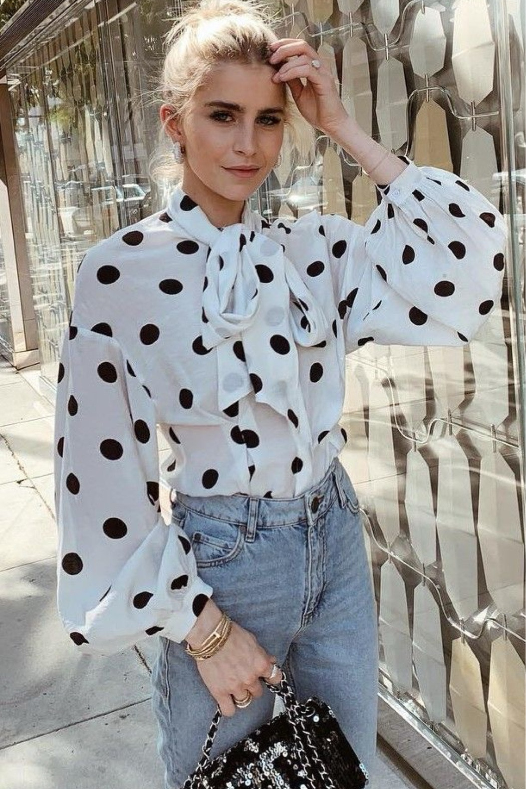 2025 fashion trends -Polka Dot 
White polka dot blouse
Light wash jeans 
Sequin bag 
