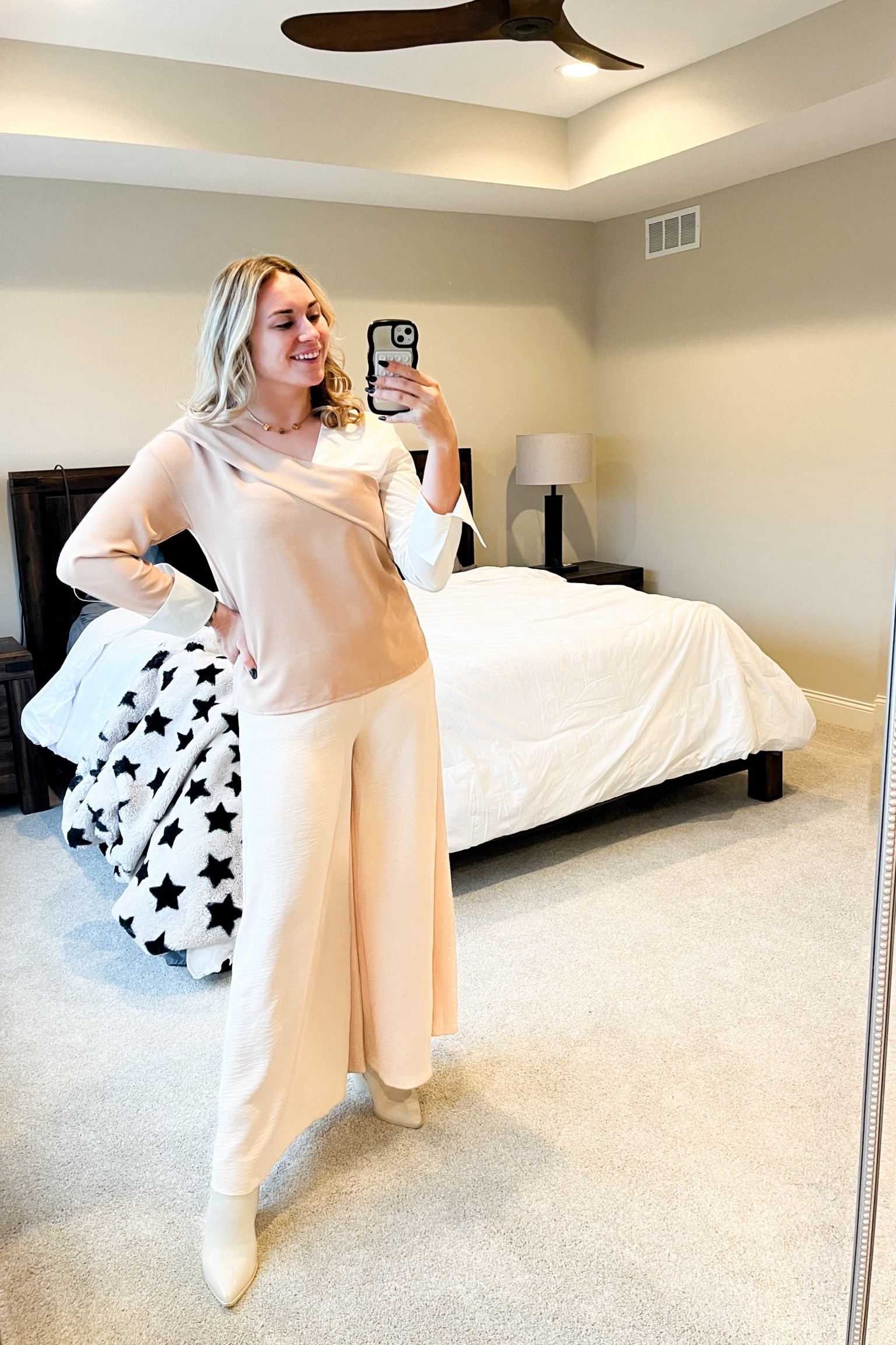 Loving these pretty neutrals. This shirt has a two tone white and cream with asymmetrical lines. I paired it with a wide leg cream pant and boot to polish off the look. 

Today is a BIG day for my family. Details to come! 

#LTKstyletip #LTKfindsunder50