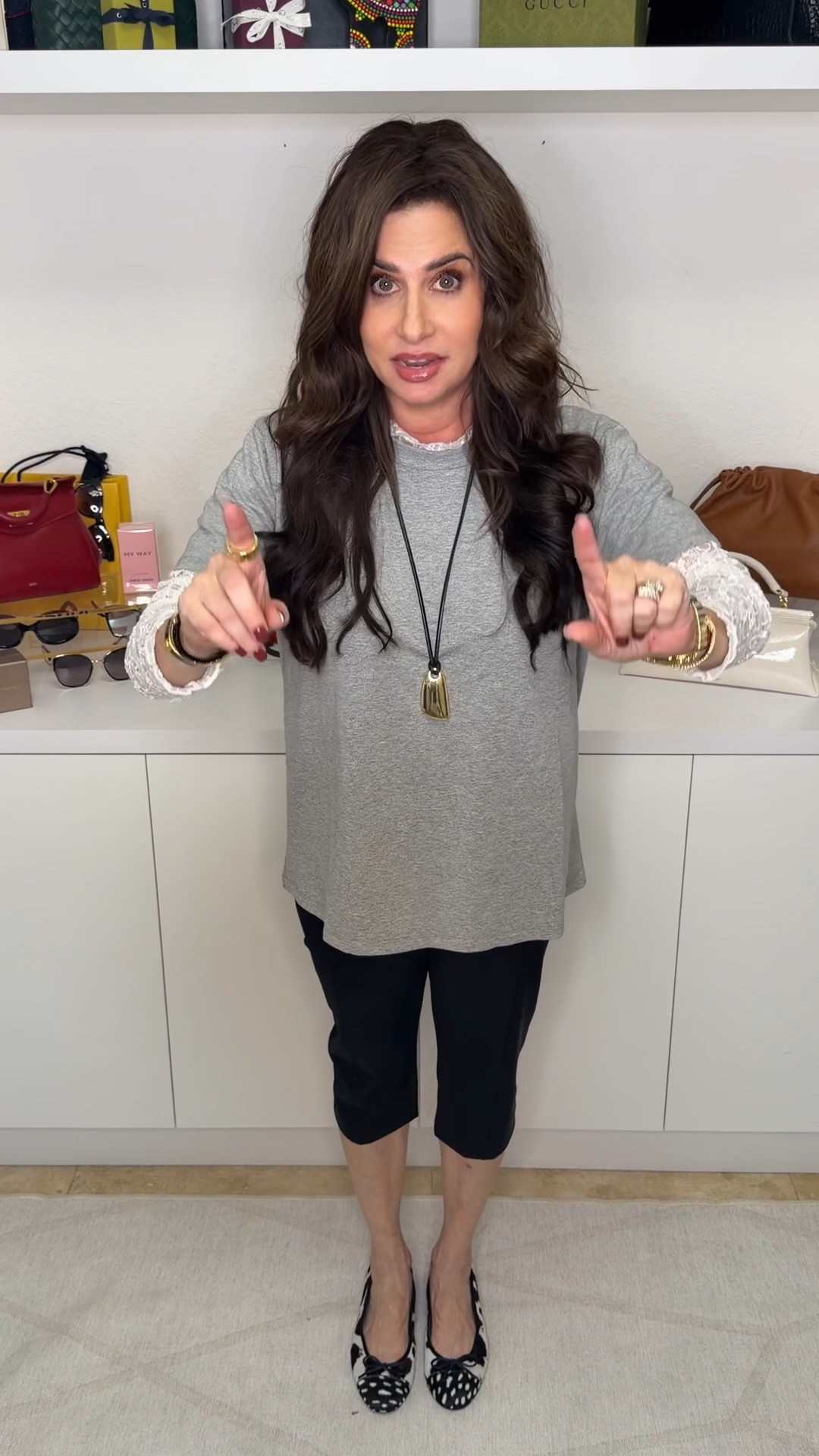 An easy everyday look. Top sm , capris 25 waist , flats TTS .