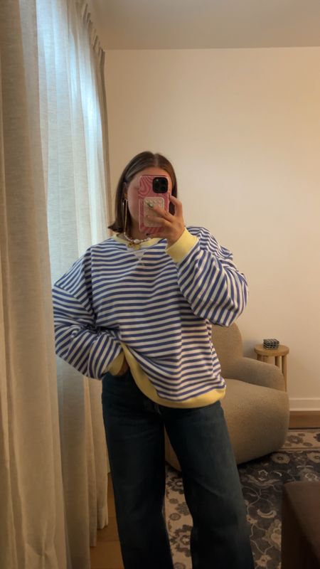 Size down in shirt it’s super soft and cute and oversized - this color isn’t online right now but other fun colors. Size small!! Jeans size down 1. Wearing 29 