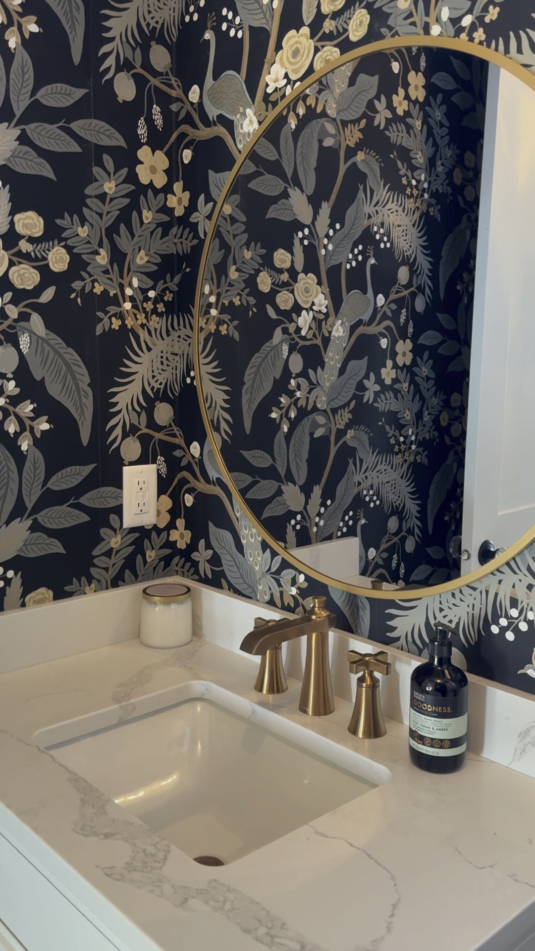 Powder Bathroom Decor - Target Mirror, Moen Fixture, area rug, Anthropologie wallpaper- Wallpaper - Such a warm and inviting bathroom on our main level! New Construction Home Decor

#LTKVideo #LTKhome