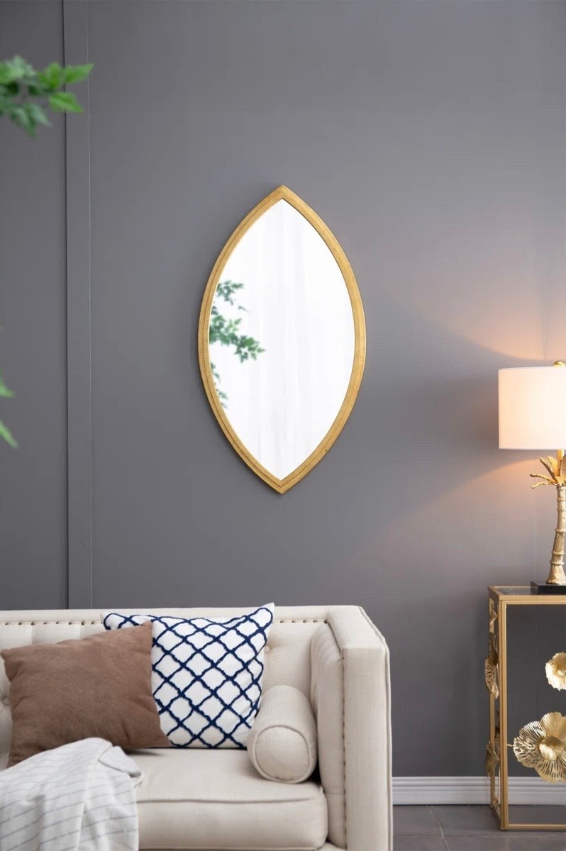 This organic-shaped wall mirror is such a statement 🤍 The warm wood frame softens the space while the sculptural shape adds instant interest. Perfect above a sofa, console, or in an entryway for that elevated, designer look.


#LTKSaleAlert #LTKHome