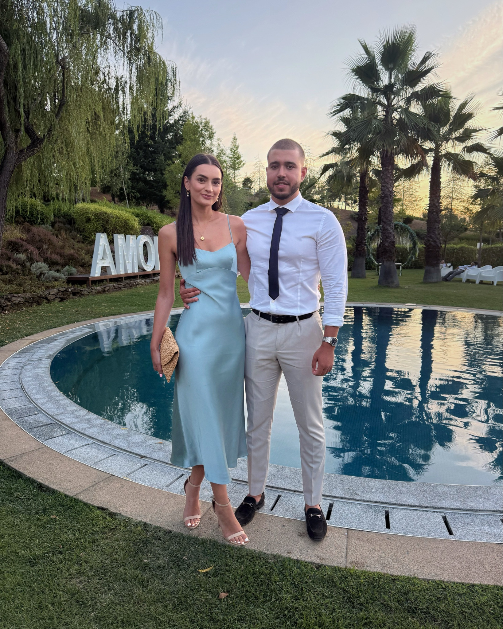 Wedding guest outfits for couples
Hers: blue dress, nude heels, straw clutch
His: white shirt, tie, trousers, loafers

#LTKdresses #LTKwedding #LTKsummer
