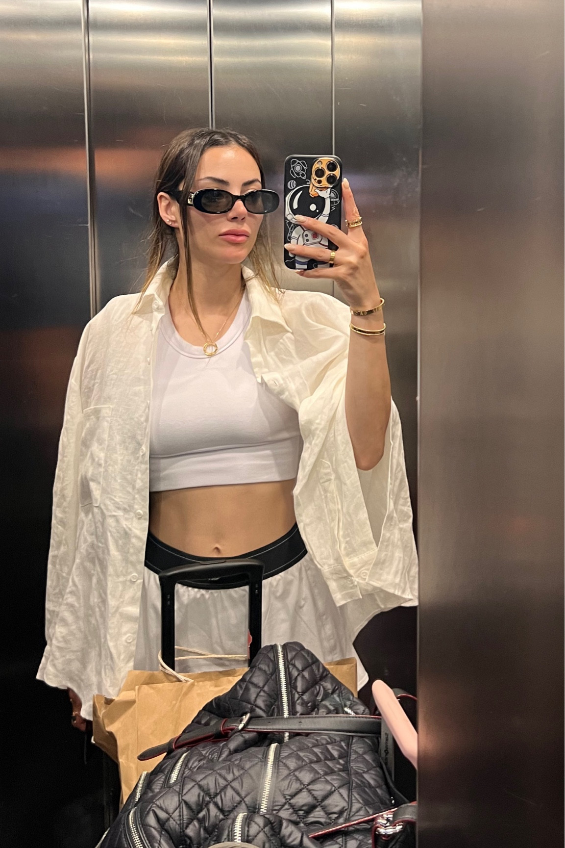 White tennis skirt, white seamless crop tank, white crop tank, (hugs and covers strongly no need for a bra) , strong support tank, white summer shirt, white woven shirt, travel duffle bag, travel bag, black oval sunglasses, black sunglasses, Gucci sunglasses, along with yoga skirtt

#LTKStyleTip #LTKTravel