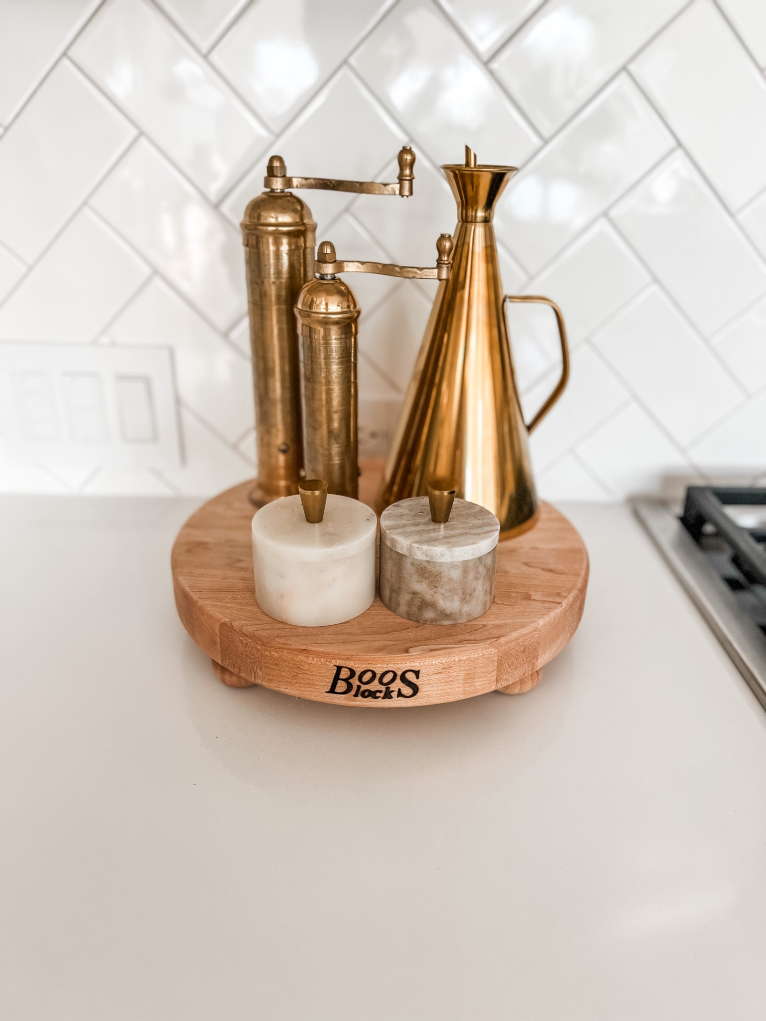 Love my salt and pepper mills + gold oil cruet. It warms up the space  

Wood round riser / salt and pepper marble cellars / kitchen essentials/ kitchen decor / kitchen must haves / small shop finds / amazon finds / amazon home / European salt and pepper grinders



#LTKhome #LTKstyletip