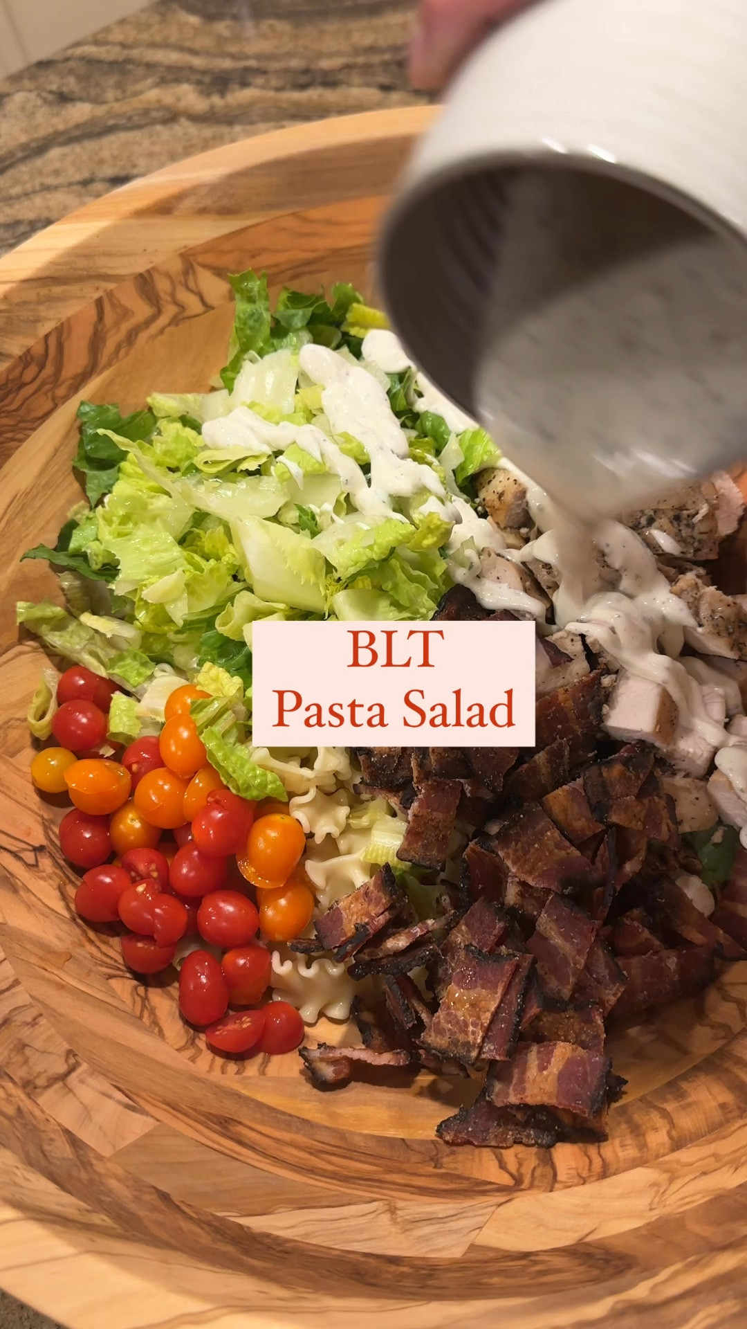 
﻿BLT pasta salad

Decided to add an extra boost of protein  with grilled chicken so technically, this is a CBLT Pasta Salad, but you get what I’m doing here.

This would be a great dish to make ahead or bring to a BBQ.

Prep the 1 lb of grilled chicken and 1 lb of bacon, let cool then dice into bite sized pieces.
Add a 1/2 lb of small sized pasta, I found these cute mini lasagna noodles at Trader Joe’s.
1 cup of cherry tomatoes, cut in half
4 cups of romaine lettuce, chopped

For the dressing:
1 cup of sour cream
1/2 cup of mayonnaise
3 tbsp ranch dressing packet
1 tbsp red wine vinegar
1/3 cup milk or water (add slowly until desired consistency)
Salt & pepper

Combine everything except the milk or water in a large measuring cup. Stir until well combined. Slowly add the milk or water until the dressing can run off of a spoon. Set aside.

To a large bowl add the pasta, lettuce, chicken, bacon and tomato. When ready to serve drizzle the dressing over top and mix well. Enjoy!

#LTKVideo #LTKFamily #LTKHome