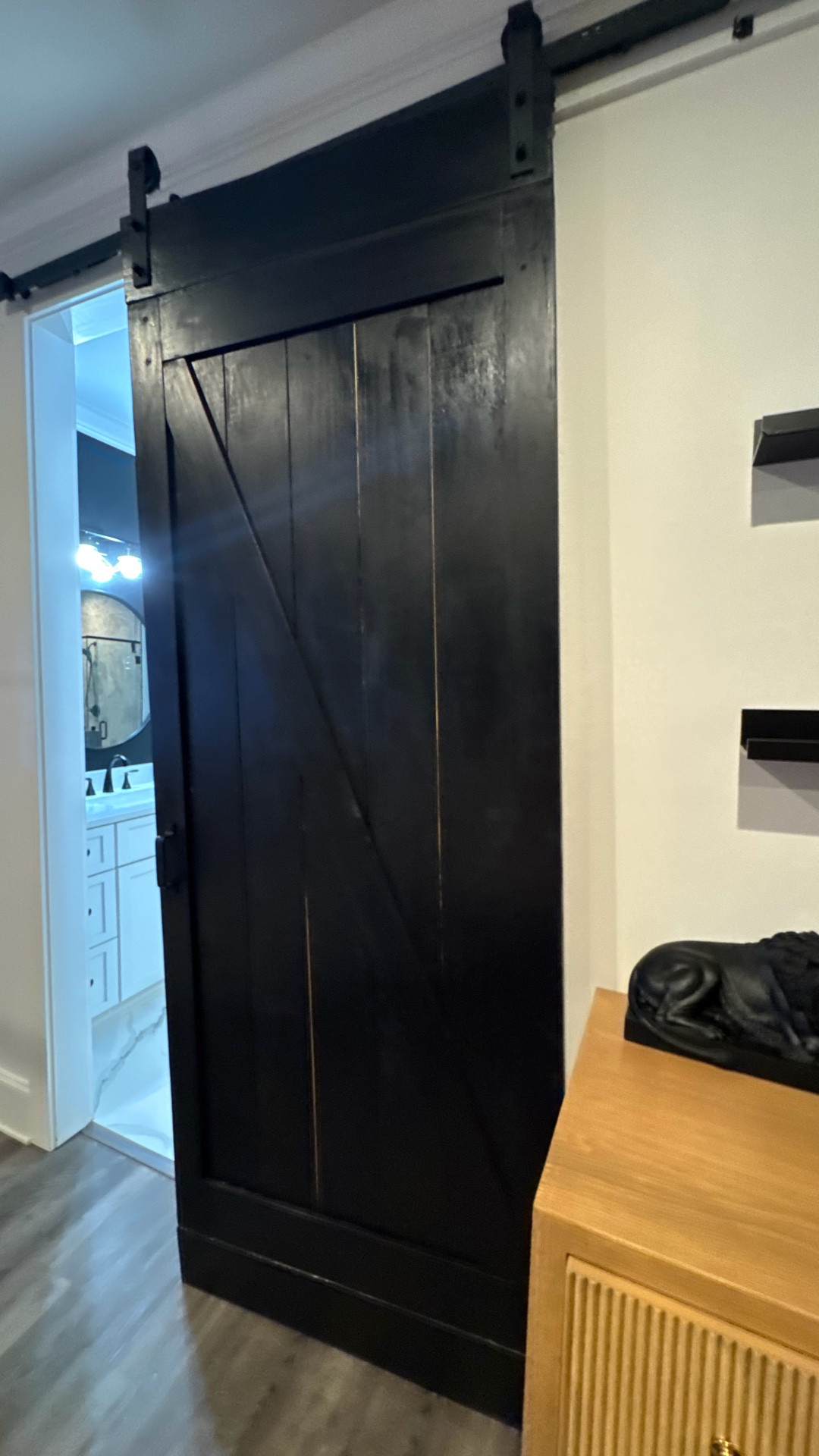 One of my favorite transformations in our home was removing the 96” heavy black barn doors that led into our primary bath. They just weren’t giving the calm, spa feel we wanted — it was giving barn instead. No offense if you love that look, it just didn’t fit the direction of our home.

We swapped them for these 96” frosted glass sliding doors and the difference is huge. The soft close, the quality, and the clean look completely elevated the space.

This was a DIY install and under $500, which is a fraction of what similar doors cost elsewhere. If you don’t DIY, a local handyman could easily install these.

The exact 96” door is linked in my LTK.

#LTKhome #homeDIY #hometransformation #interiordesign #modernhome