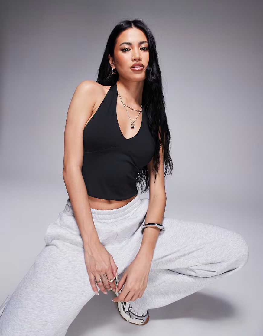 ASOS DESIGN sculpting halter neck crop top in black | ASOS (Global)