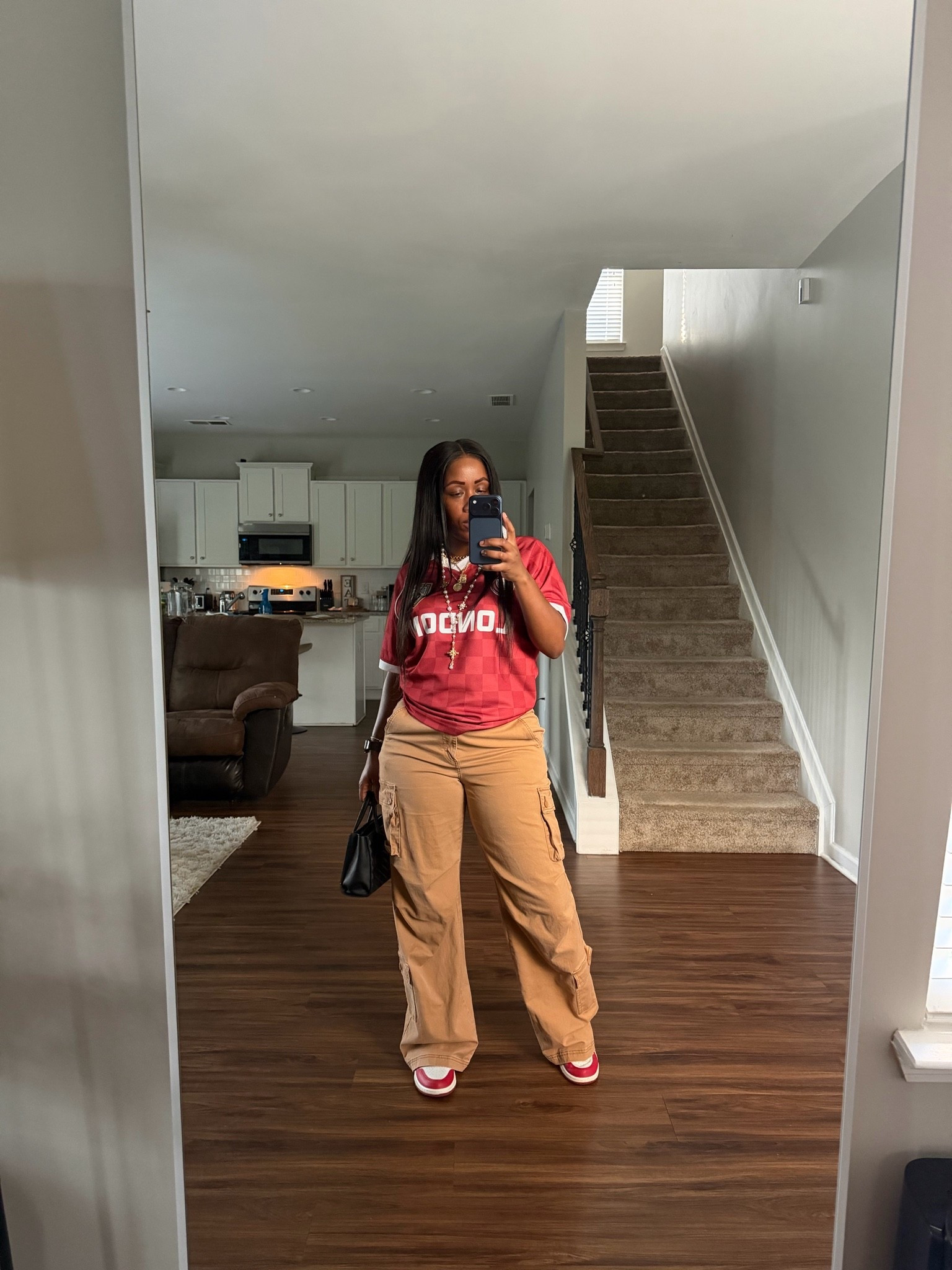 Soccer game outfit idea. I styled this soccer jersey short with cargo pants

#LTKOver40 #LTKPetite #LTKootd
