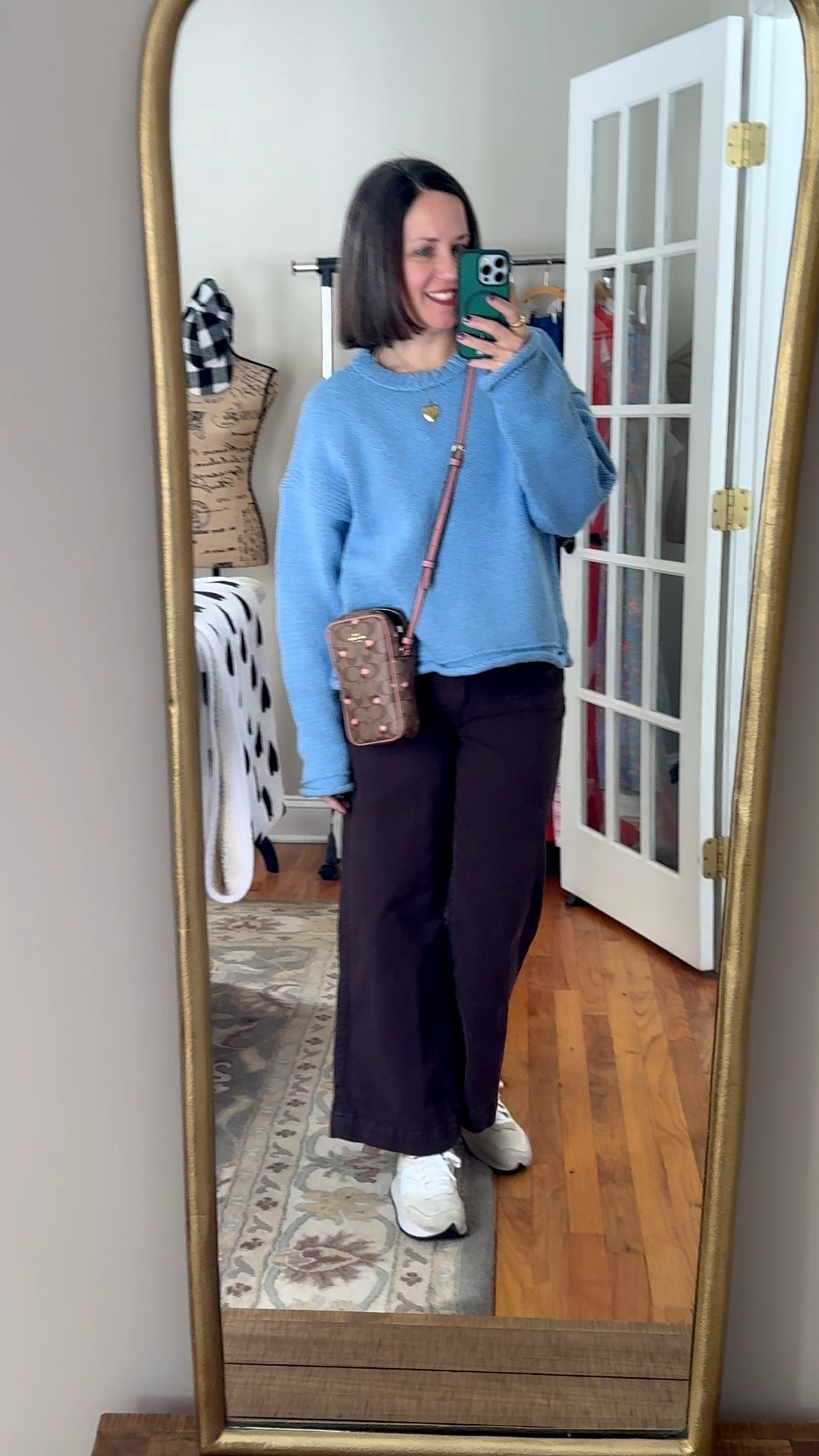 My winter ootd today~ Anthropologie sweater, Paige brown wide leg pants, cute Coach heart crossbody (from years ago), New Balance sneakers. 👟 

#LTKdayinmylife #LTKOver40 #LTKSeasonal