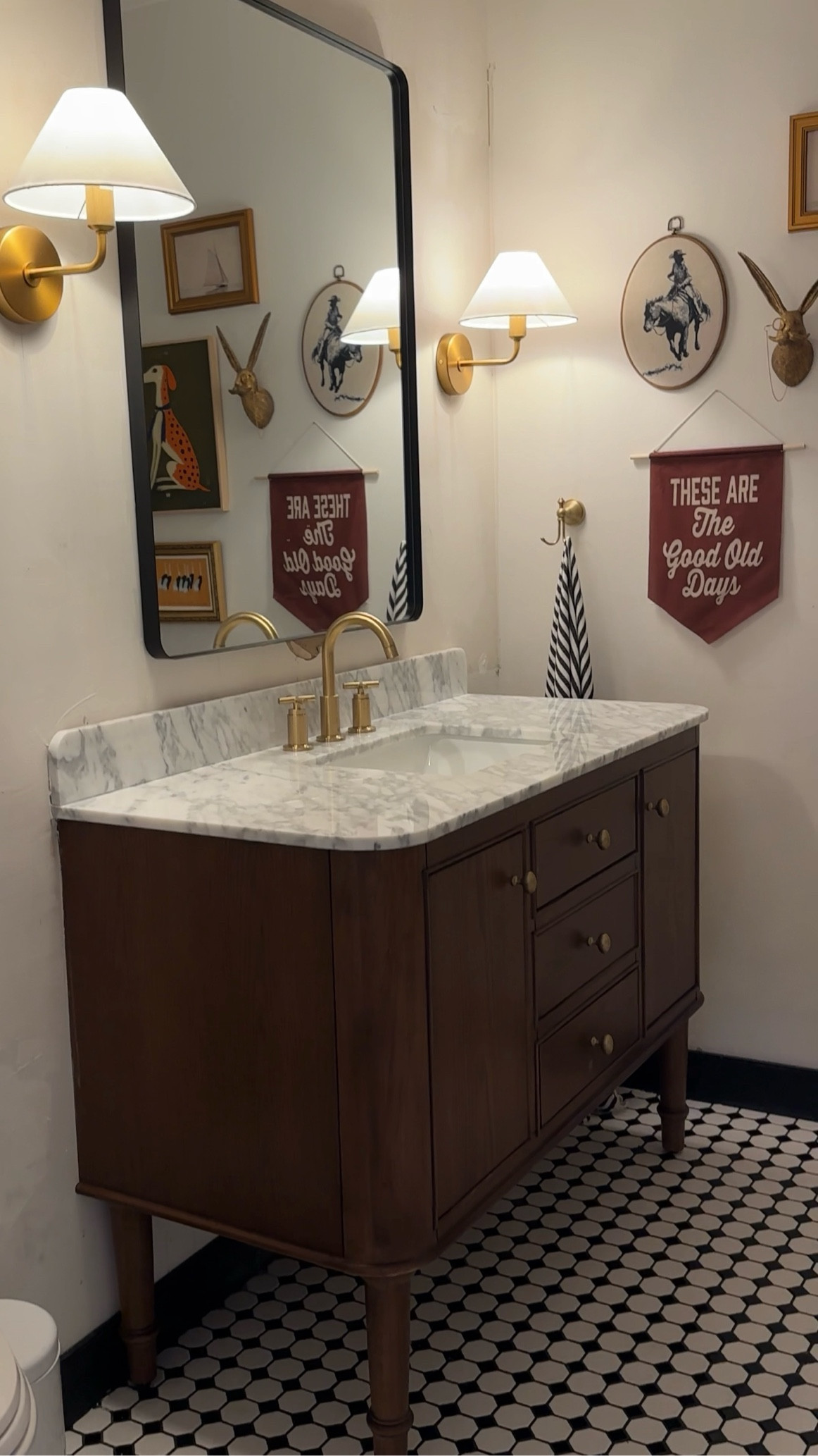 Bathroom vanity, bathroom mirror, sconces, wall lights, faucet, tiles

#LTKHome