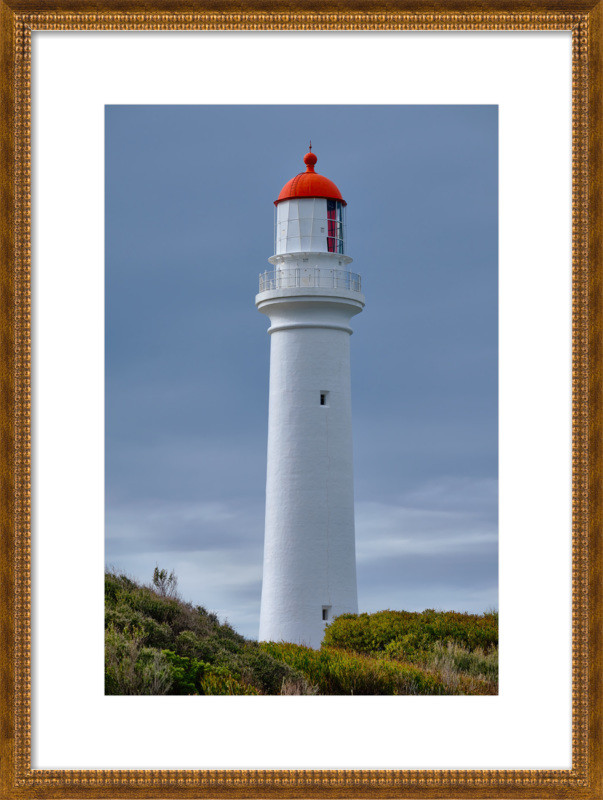 The lighthouse at the Ocean | Artfully Walls