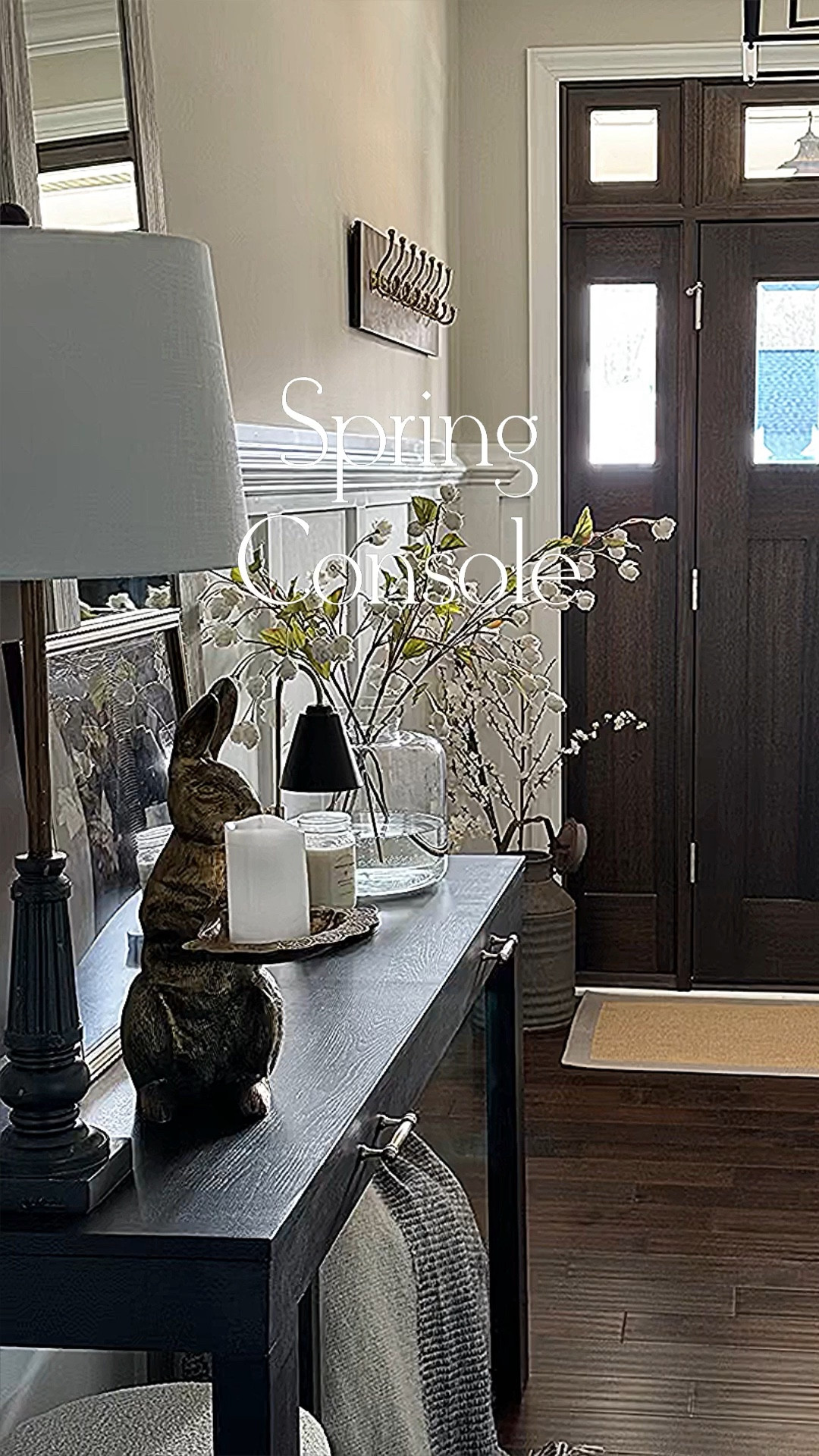 Spring Console

I have a moody spring look going on in my entryway. My console table and gold bunny were DIYs so I’m unable to link the exact ones. I have linked some similar.

Glass terrarium/vase, cream hops stems, candle warmers, gold rabbit, vintage print, boucle ottoman, throw blanket



#LTKhome #LTKSeasonal #LTKVideo
