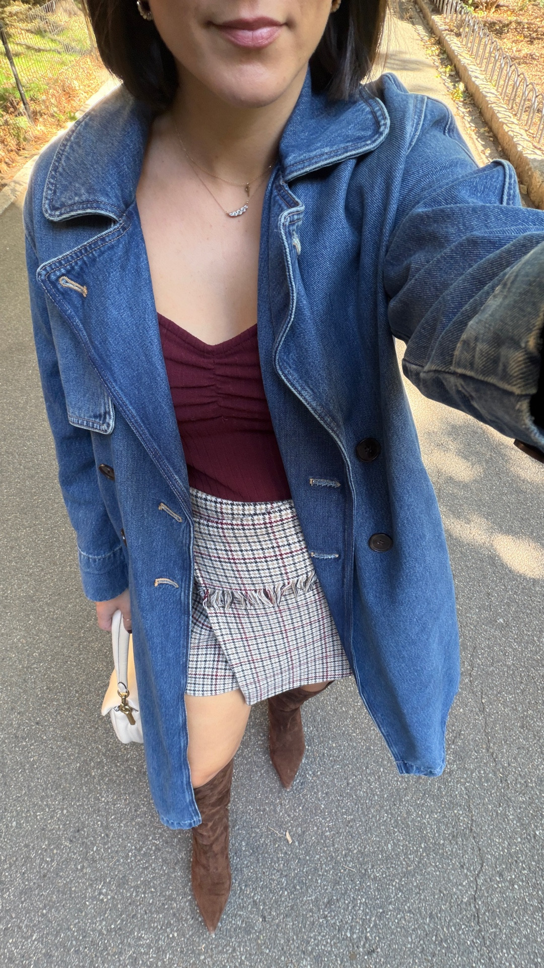 Mini skirt outfit idea. Ganni plaid mini skirt with knee high boots. Denim trench. Linking similar options when possible 

#LTKShoeCrush #LTKFindsUnder100 #LTKStyleTip