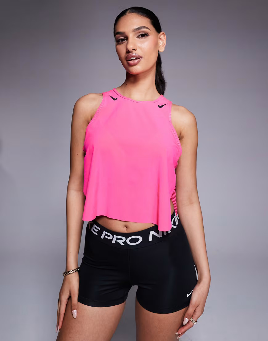 Nike Running Aeroswift cropped tank top in pink | ASOS (Global)