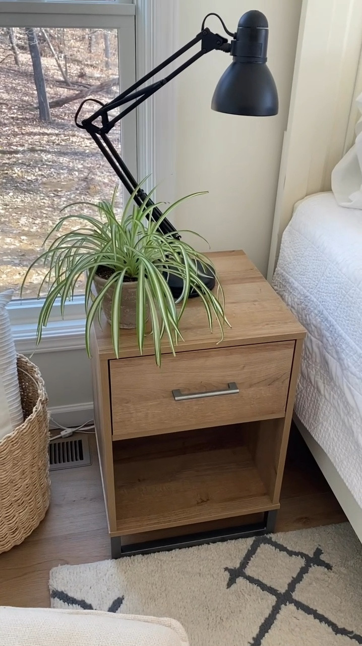 LOOK what I added to my bedroom decor! ✨

I’m all about creating a minimalist, cozy bedroom with a neutral color scheme, and this new natural wood nightstand fits perfectly! 🤍

✔ Modern metal legs for a sleek touch
✔ 1 drawer + bottom storage for functionality
✔ Neutral wood tone that blends seamlessly with today’s home decor
✔ Unbelievably affordable price!

This nightstand is a must-have if you love minimalist style with a modern edge. #Farmhouse40Home #stylebybb #BedroomDecor #MinimalistStyle #HomeInspo #AffordableHomeDecor #Bedroom #CreateAHomeYouLove 

#LTKHome #LTKFindsUnder100 #LTKMostLoved