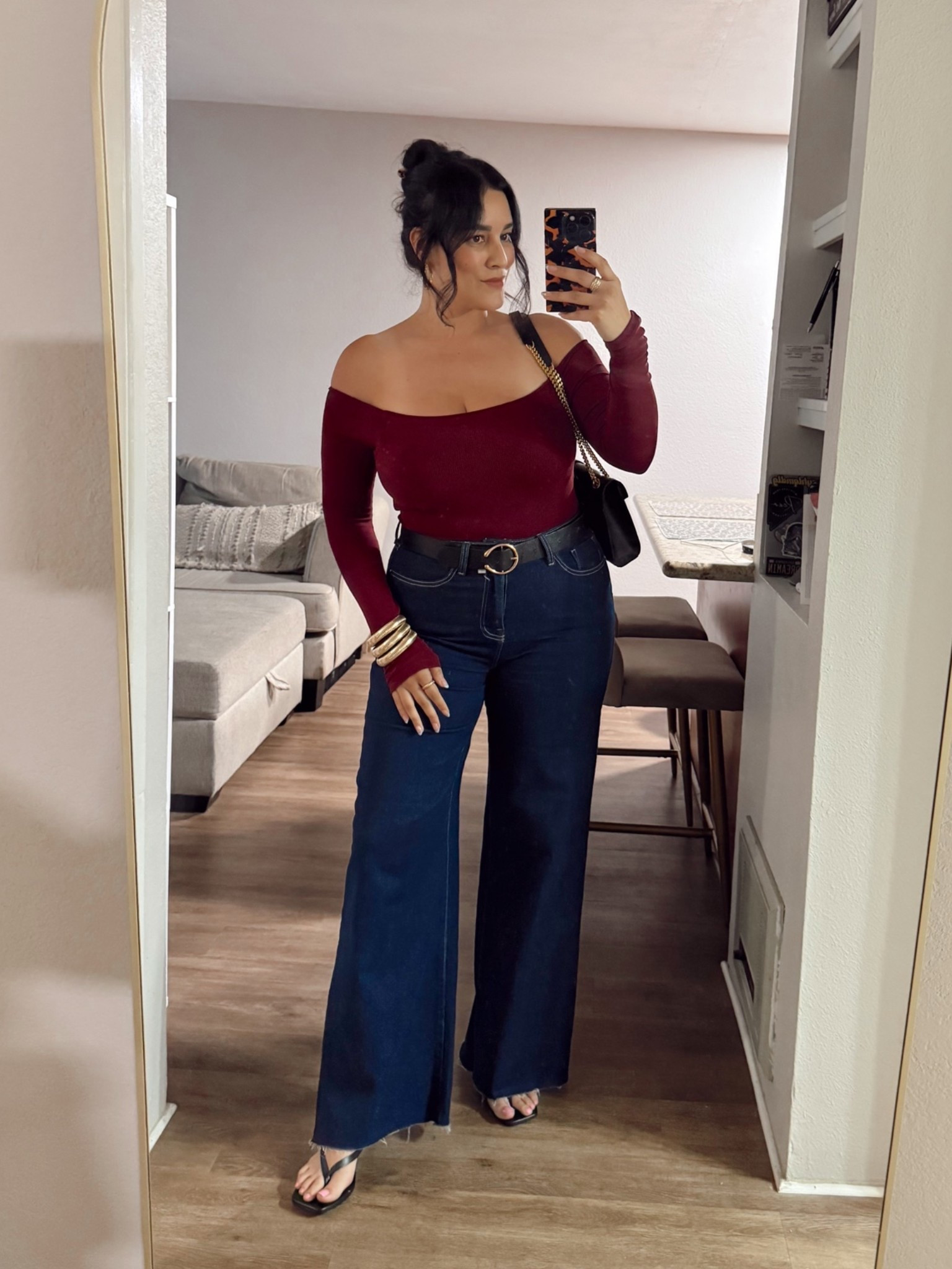 An off shoulder top with dark wash wide leg jeans will forever be one of my favorite going out combos. The deep red color feels so chic for dinner, drinks, or date night and these jeans fit sooo good 👠🍷

Sizing Deets👇🏽
Top // M
Jeans // 30
Kitten Heels // 8

#LTKootd #LTKOver40