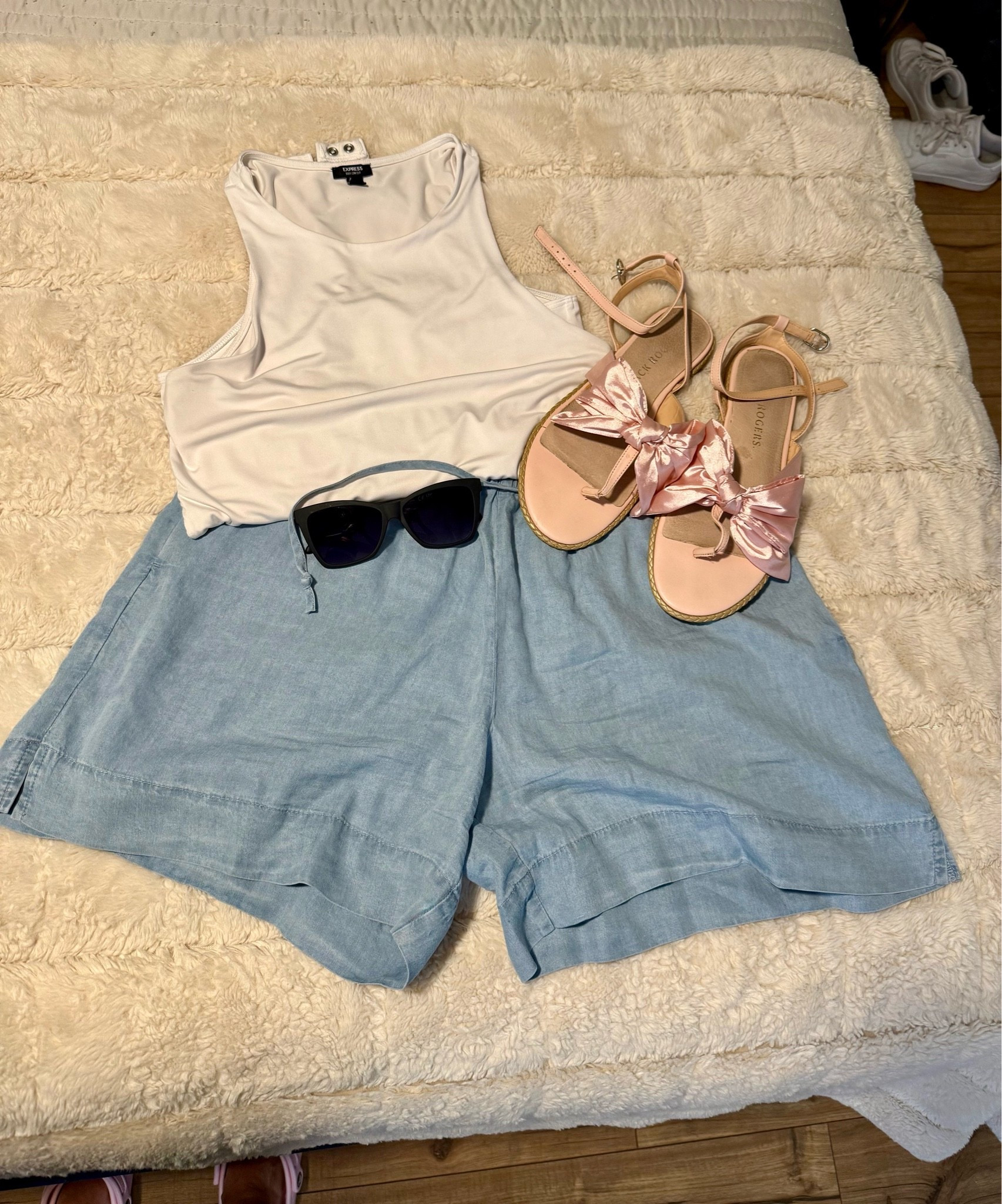 I love a white tank look! I think it is so classy so I rock a white bodysuit with high waisted shorts like these ultra light chambray shorts from RBX Active! Paired with sandals from Jack Rogers and my favorite Goodr’s!

#LTKgrwm #LTKootd #LTKdayinmylife