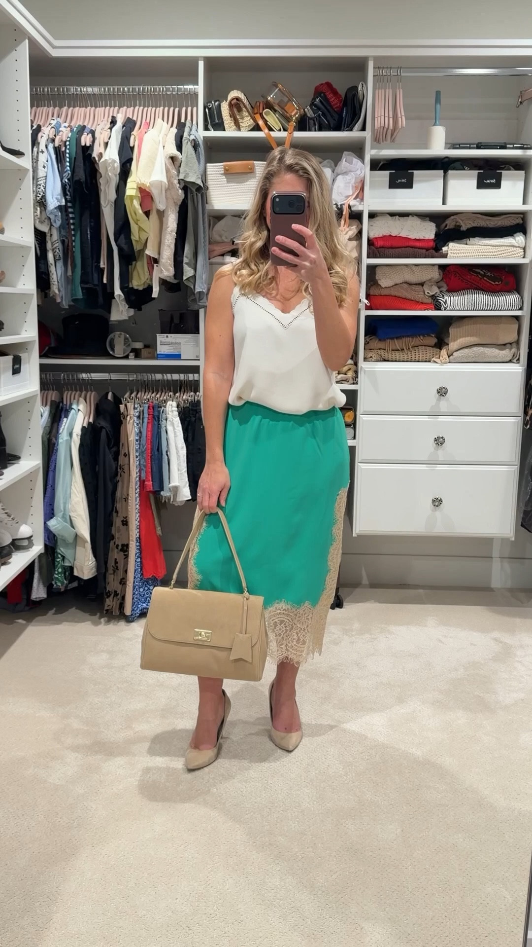 Spring outfit, but make it effortless 🌿✨

A satin midi skirt paired with a soft neutral cami is one of those combinations that always works. It feels light, feminine, and polished without trying too hard.

I love how the soft tones keep it classic, while the texture from the lace and satin adds just enough interest. Easy to wear for work, lunch, or a night out with a quick accessory switch.

Everything is linked in LTK 💛

#LTKWorkwear #LTKPetite #LTKootd