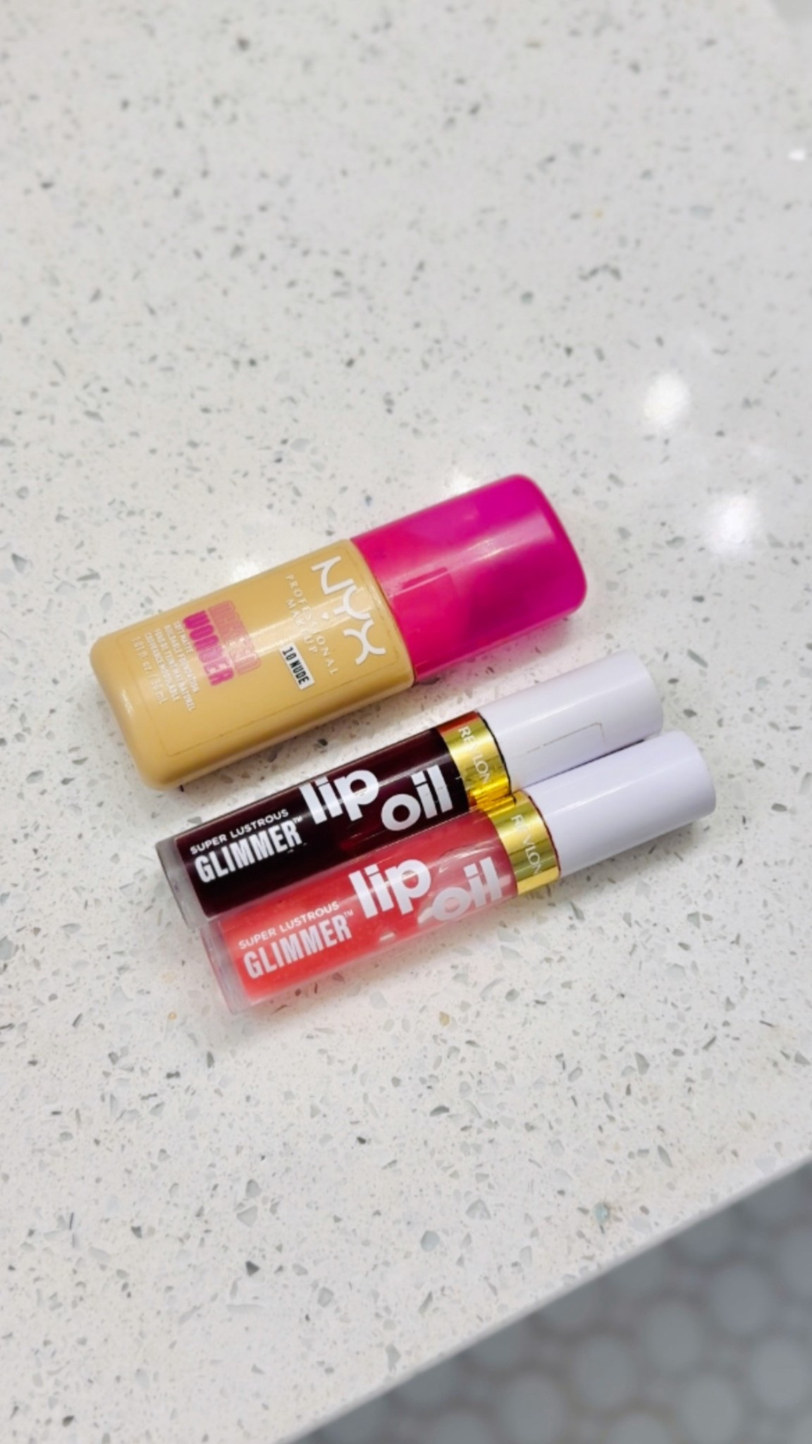 This NYX foundation is a great drugstore option if you’re looking for long wear foundation with great coverage! And these Revlon lip oils are my current obsession: they’re like a gloss and lip stain in one!

#LTKBeauty #LTKdayinmylife #LTKgrwm