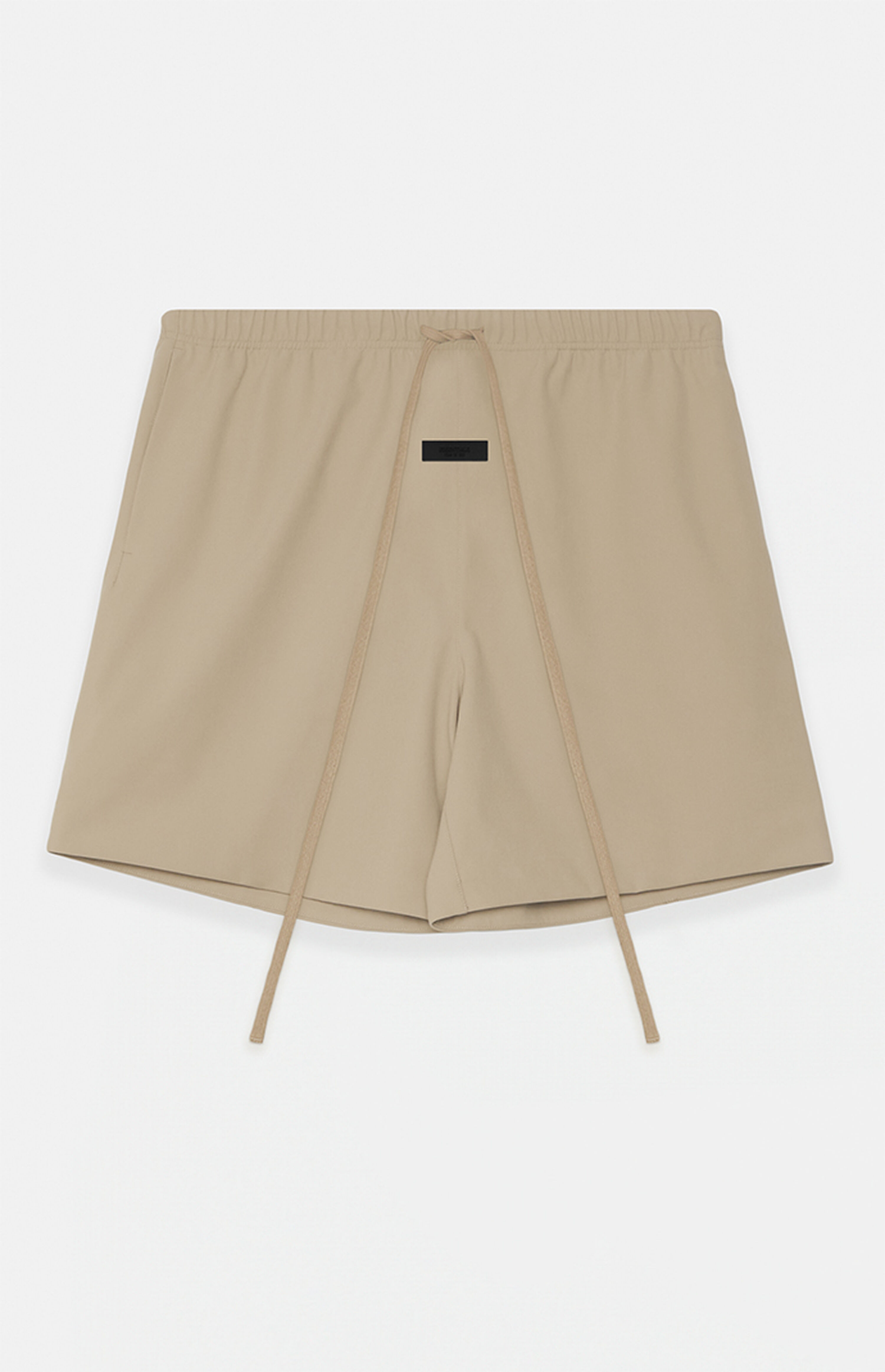Fear of God Essentials Desert Sand Bonded Nylon Soccer Shorts | PacSun