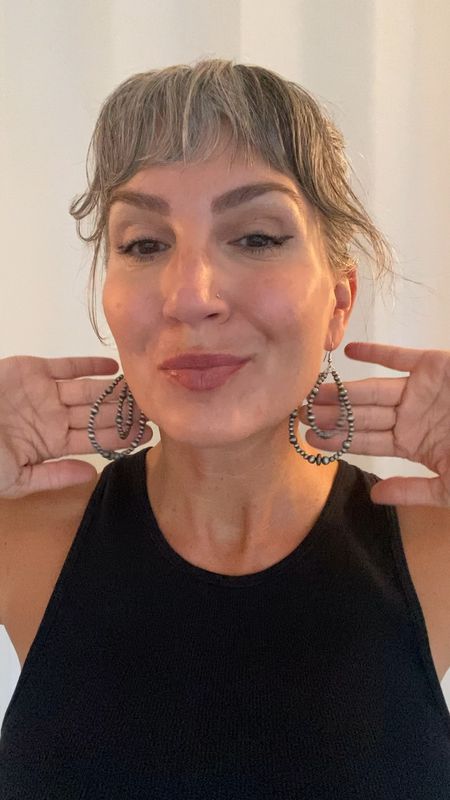 If you’re looking for a lightweight statement earring (our earlobes aren’t getting any younger) but love the look of silver Navajo pearls, these beaded loop dangles are a great lightweight alternative and are super inexpensive too!

#LTKstyletip