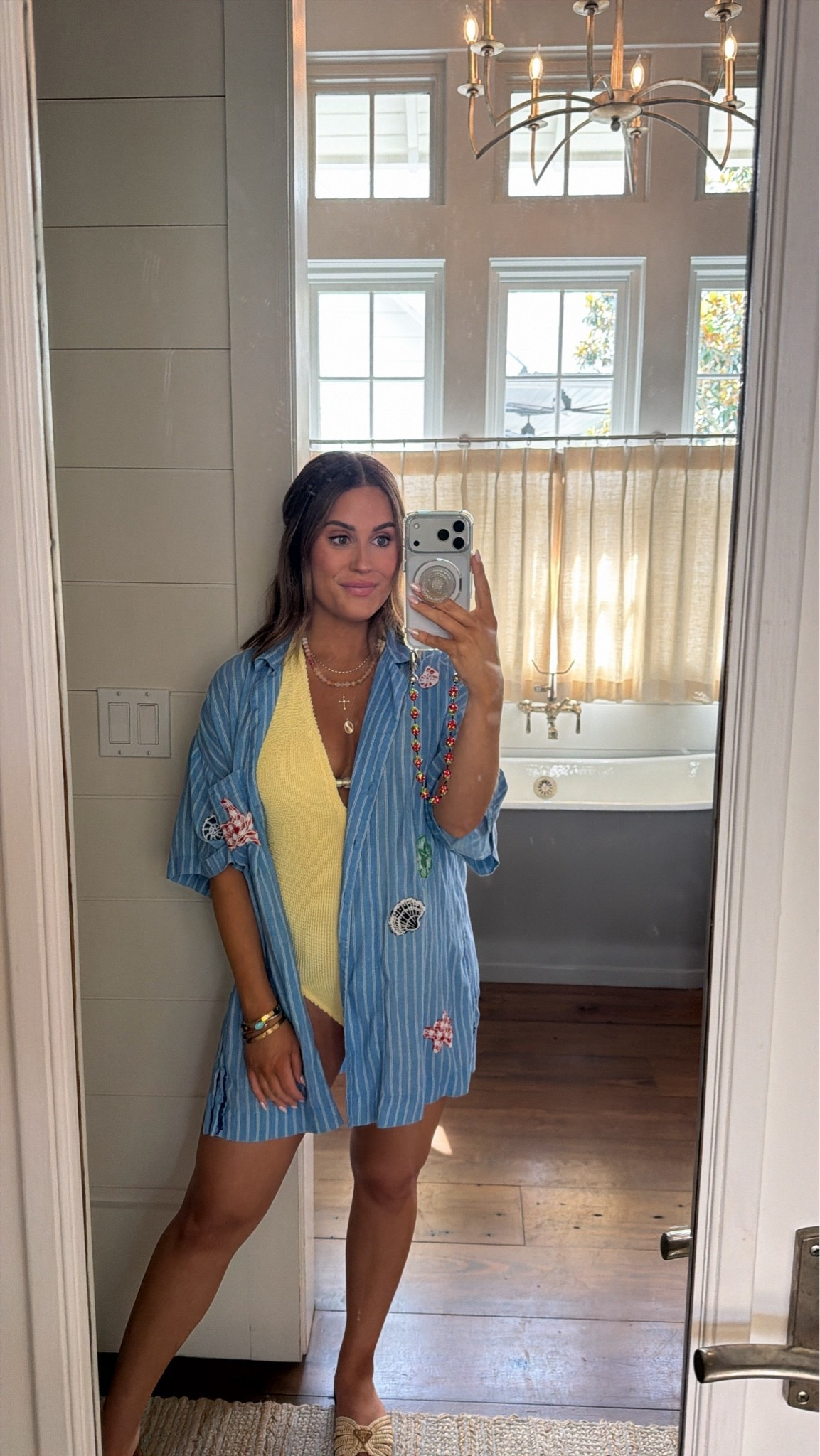 Yellow halter is one size fits all- this brand is a splurge, but fabric is unreal and I can wear both pregnant & not. Love the reading on it too! 
Button down in Anthro from last year! 

Currently 26 weeks pregnant. 

Swimsuit, one piece, bump friendly, maternity