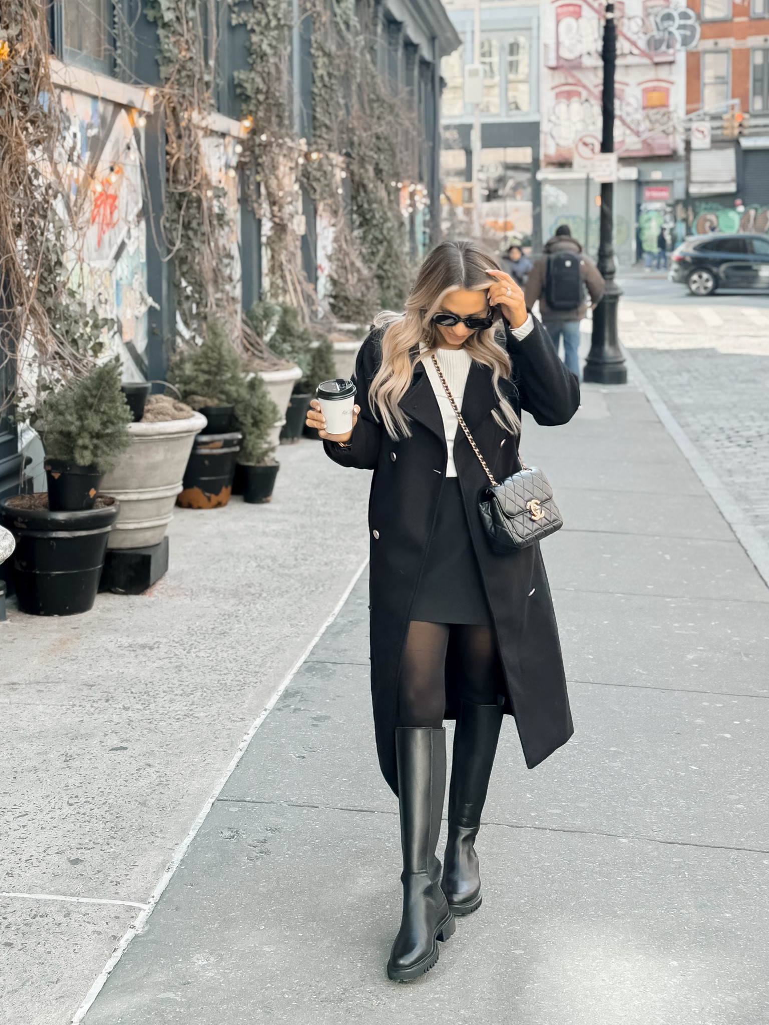 NYC shopping & brunch outfir! These tights are rip resistant and this skort is amazing quality! Boots are so comfy to walk in too! Wearing a small in coat, coat in sweater and xxs in skort  

#LTKPetite #LTKStyleTip #LTKNYFW