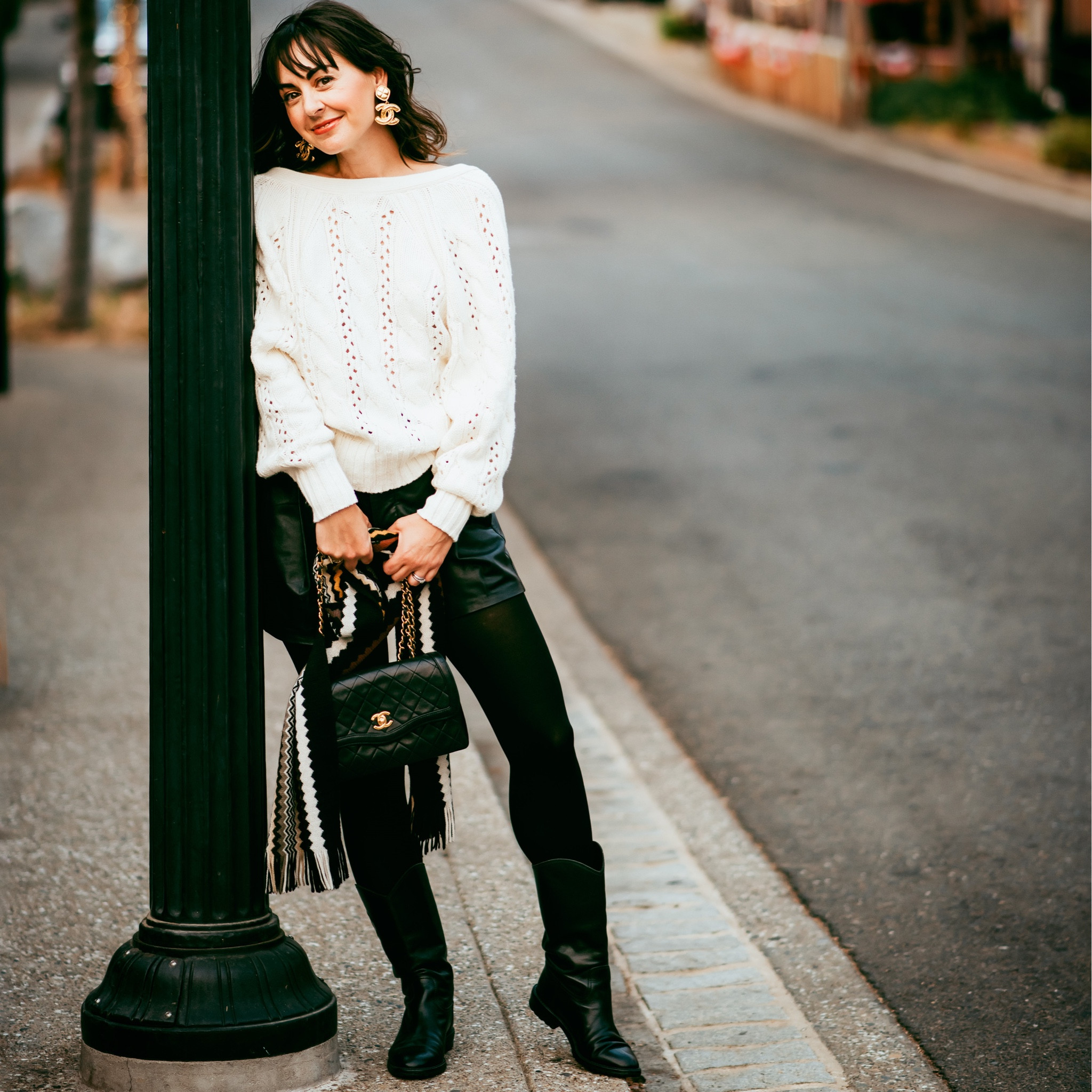 MOTO BOOTS WITH BLACK TIGHTS 
& A BACKWARDS CARDIGAN