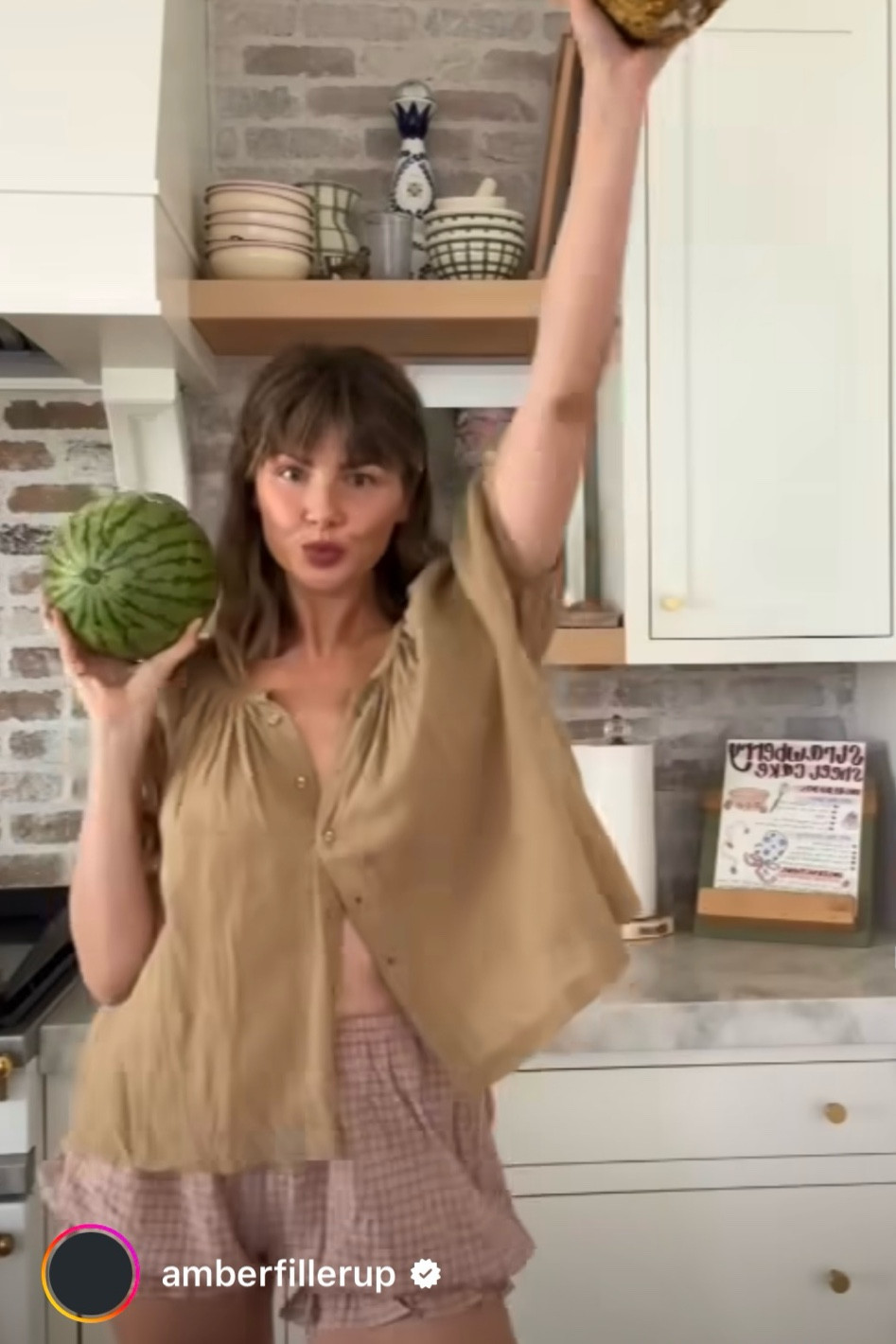 Amber wears the Doen June top in Driftwood & Sonderhaus Romeo Sleep Set shorts in pink plaid