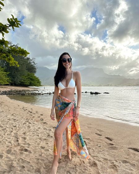 Kat Jamieson wears a bikini with a Zimmermann sarong. Pareo, swimsuit, swim, swimwear, Hawaii, what to wear on vacation. 

#LTKtravel #LTKSeasonal #LTKswim