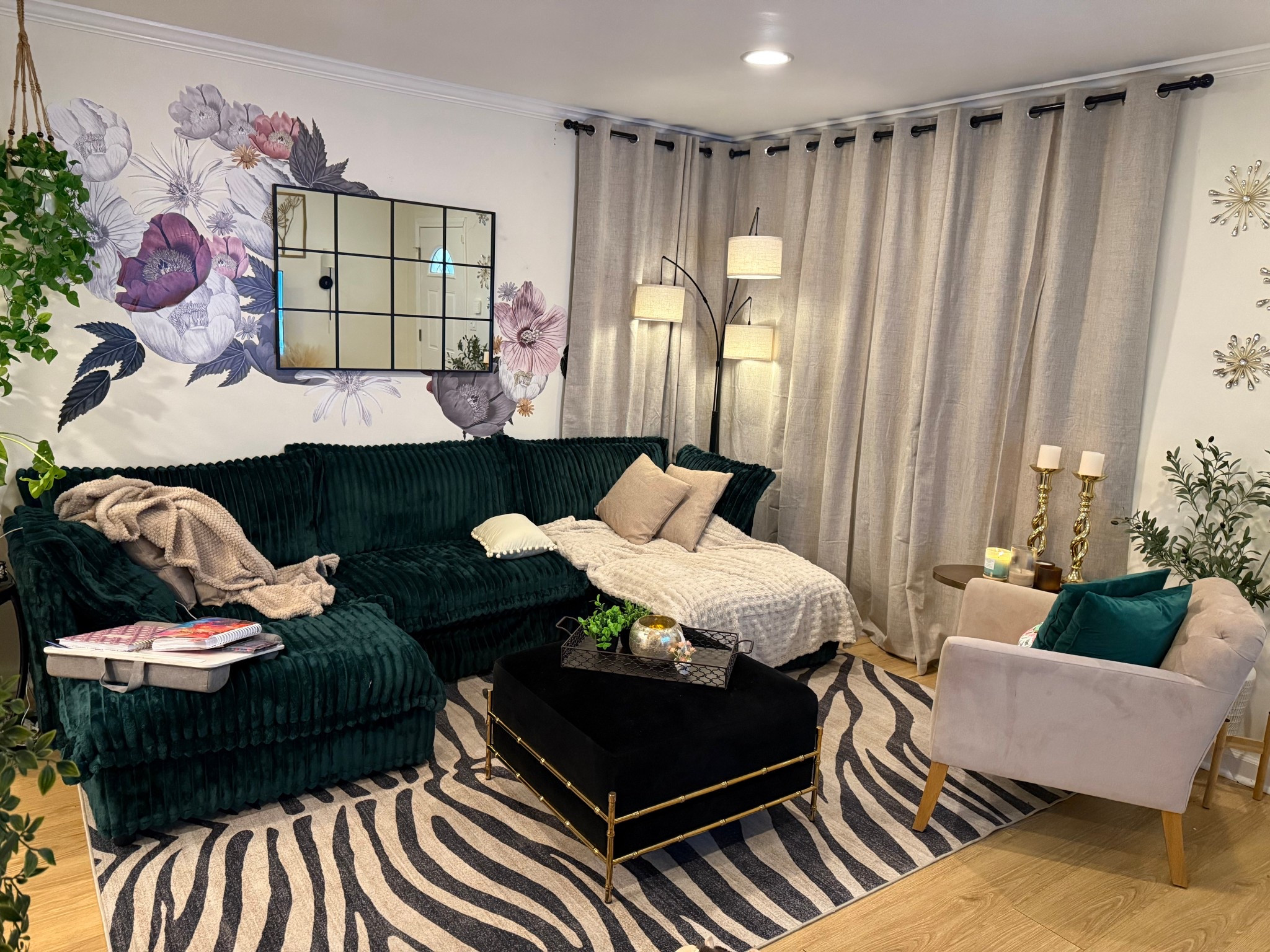 This 30 x 40 window pane mirror is currently on sale on Amazon and it made my small living room like a lot bigger!

The floral wall decals are by Wallpick and they are usable and you can move them around as much as you need'

ps It is so much fun being able to decorate with every girly glam eclectic thing I want now that I’m living alone for the first time!

#LTKHome #LTKOver40