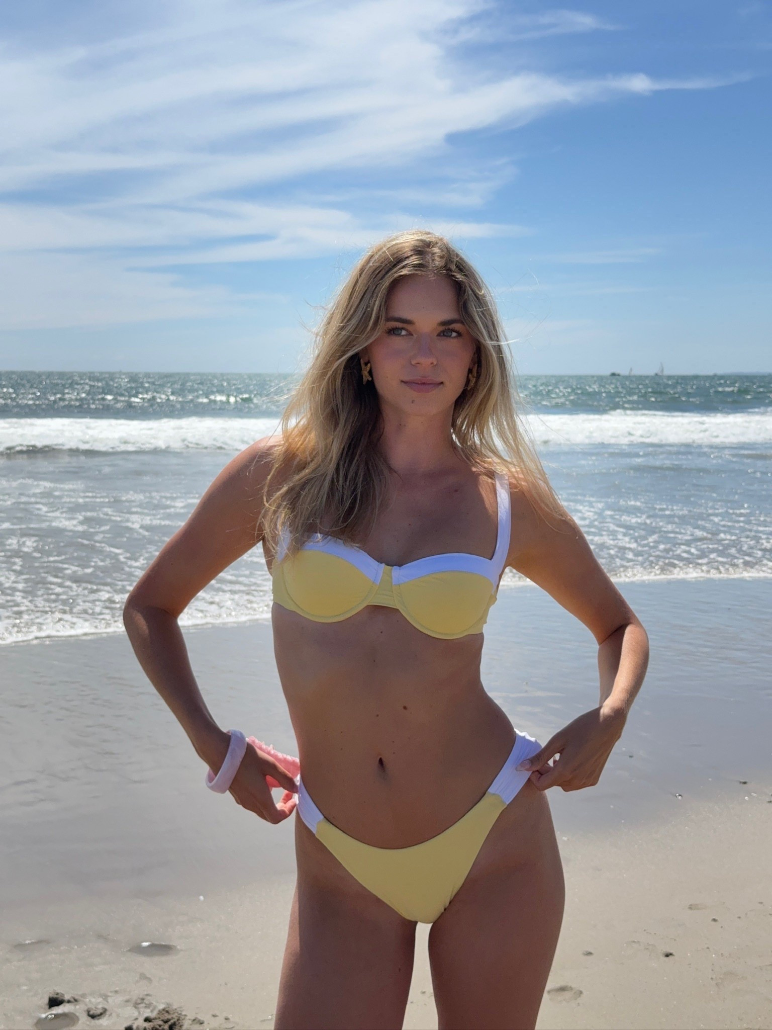 this bikini screams chic but fun 💛 the white accent color is such a cute addition to the suit- currently on sale! 

#LTKSwim #LTKStyleTip #LTKSeasonal