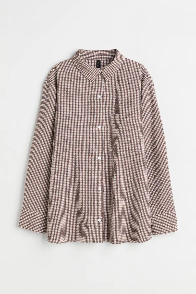 Long shirt in airy cotton seersucker with a collar, buttons down the front and a yoke at the back... | H&M (US + CA)