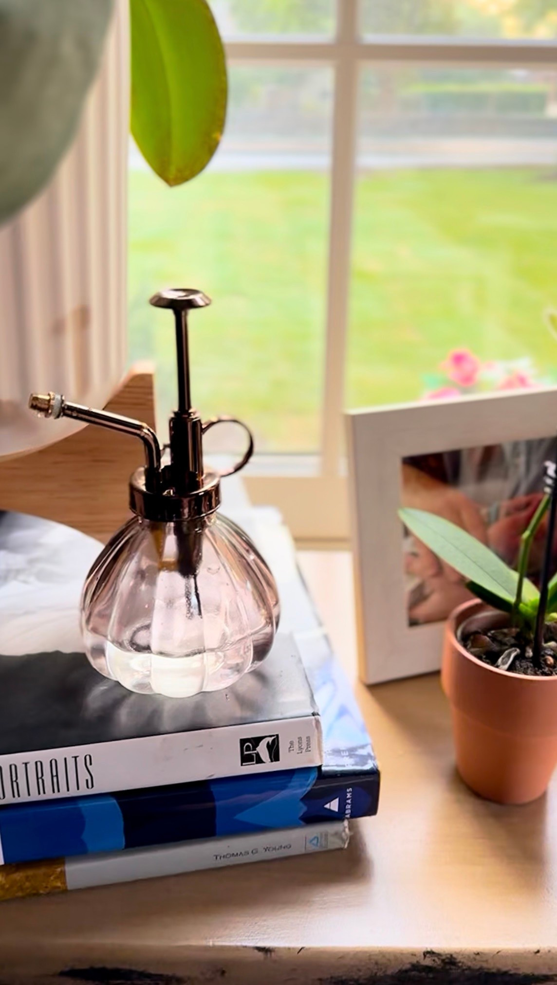 A quiet little moment I pass by a dozen times a day. 🌿 The softest light, a stack of art books, and a glass mister that makes watering my plants feel like a ritual. #SlowLiving

I’ve linked inspired finds on my LTK that bring this cozy vibe to life 🤎

#CozyCorners #LTKhome #MoodyInteriors #SlowLivingHome #RootedAndWild #EclecticHomeStyle #RusticLuxe #HomeVibes #InteriorMood #LTKfinds #LTKlinkinbio #CollectedHome #CottageModern #SeasonalLiving #MyLTKhome