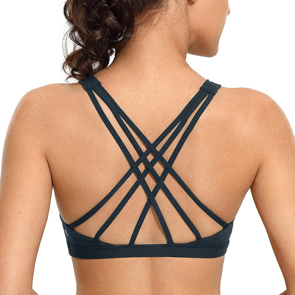 CRZ YOGA Strappy V Neck Sports Bras for Women - Criss Cross Back Wireless Padded Workout Yoga Bra | Amazon (US)