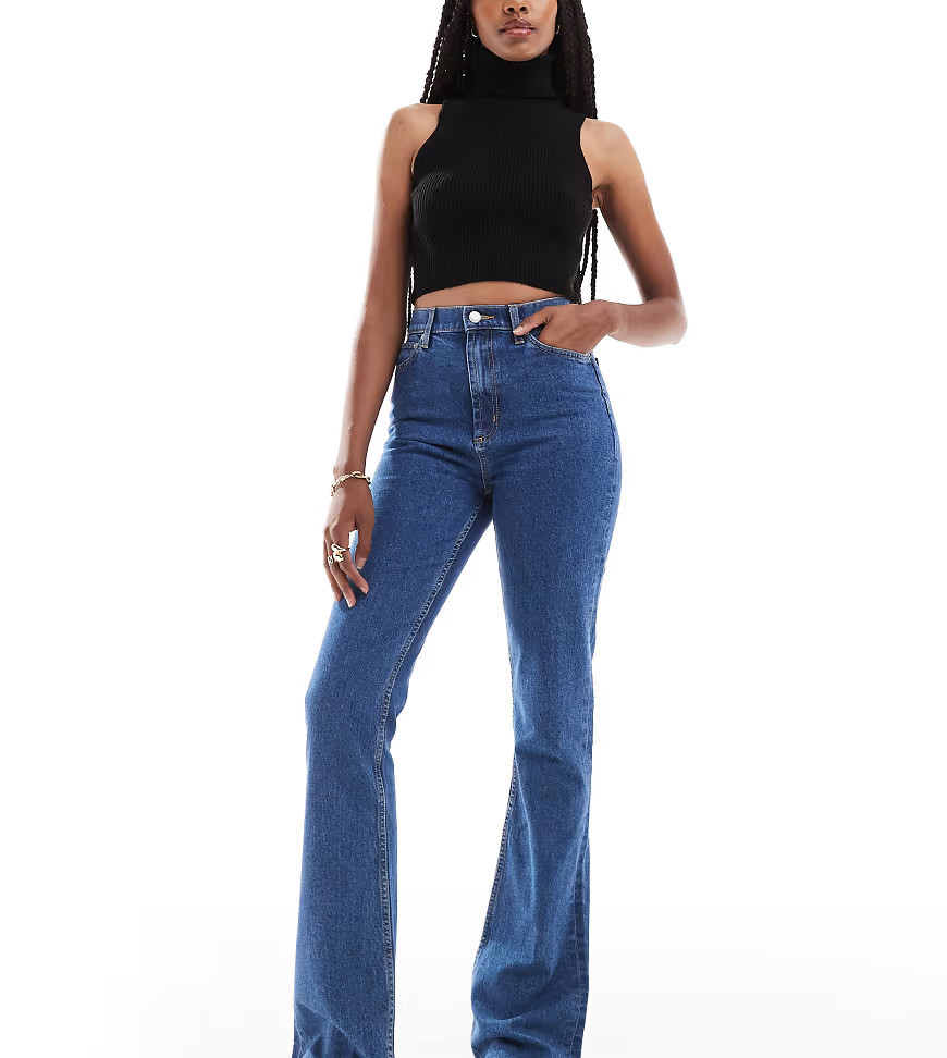 ASOS DESIGN Tall mid rise flare jeans in mid blue | ASOS (Global)
