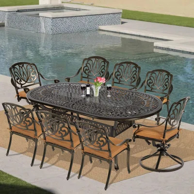 Risingsun Oval 8 - Person 83.8" Long Dining Set with Cushions | Wayfair North America