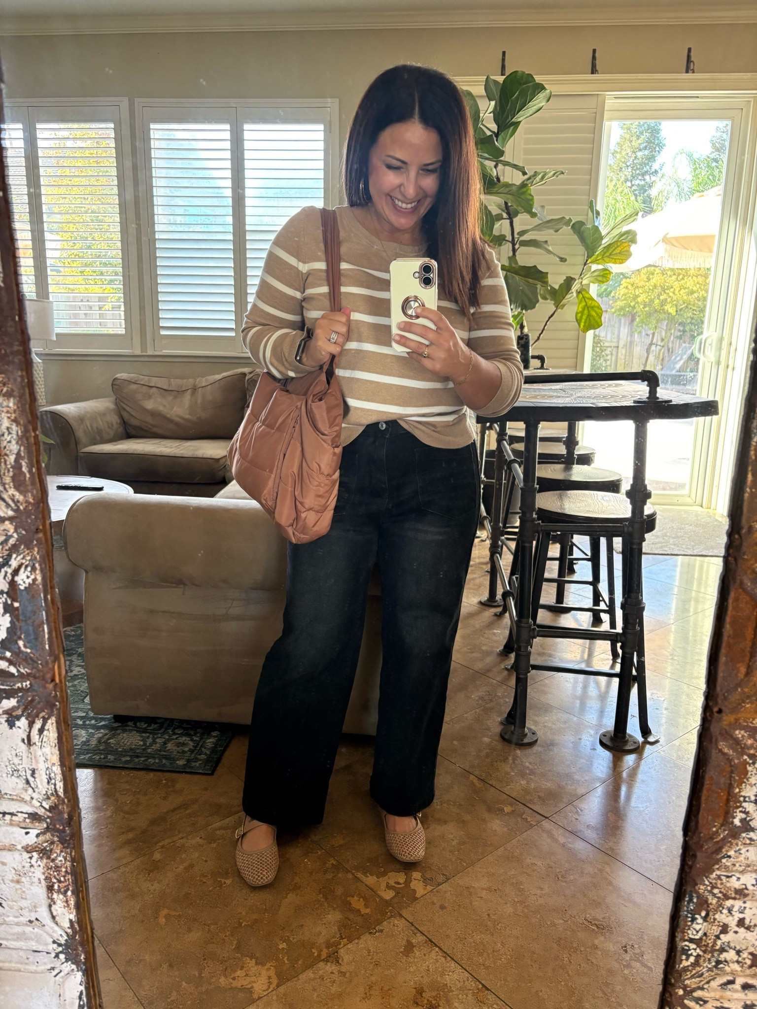 Teaching outfit of the day 🤎 A comfy fall teacher outfit that I could actually wear all day!

These petite-friendly jeans are one of my favorites—I’m wearing a size 4. Paired them with a cozy striped sweater, my favorite mesh ballet flats (the memory foam makes them SO comfortable), and this pretty neutral tote.

👖 Jeans: size 4
🥿 Ballet flats: size down ½ size
🤎 Everything linked!