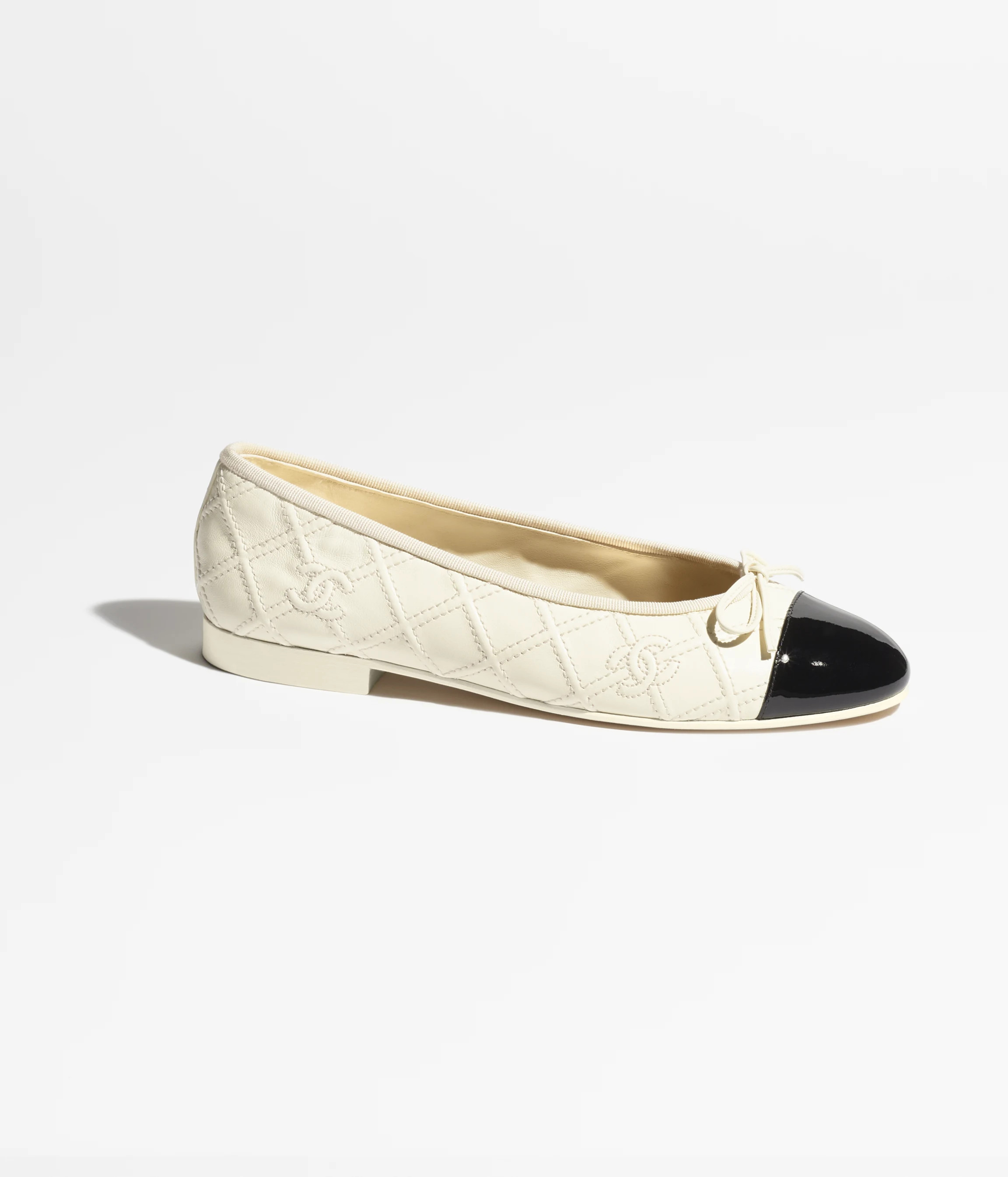 Ballet flats - Lambskin & patent calfskin, ivory & black — Fashion | CHANEL | Chanel, Inc. (US)